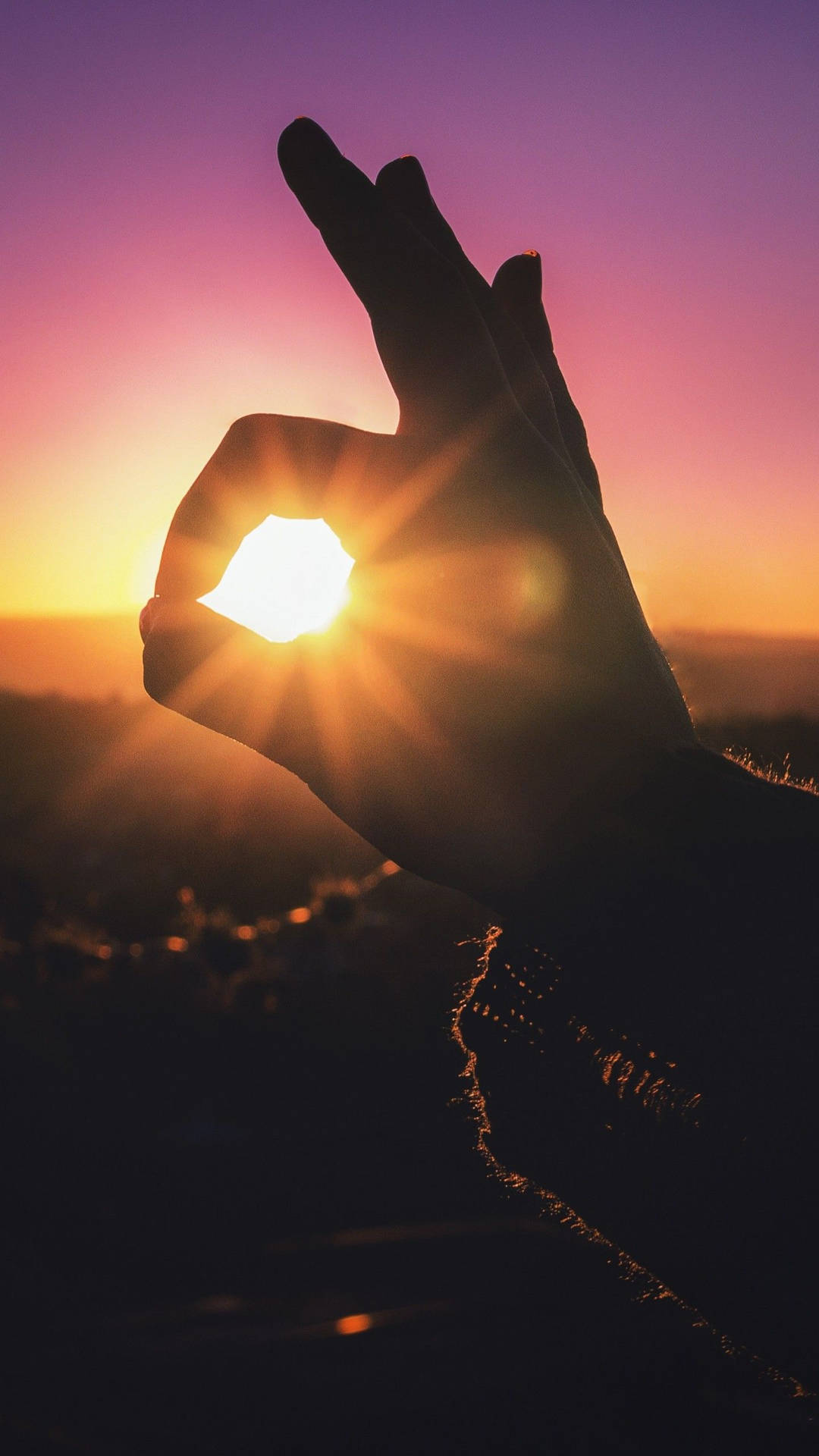 Hand And Sunset Background