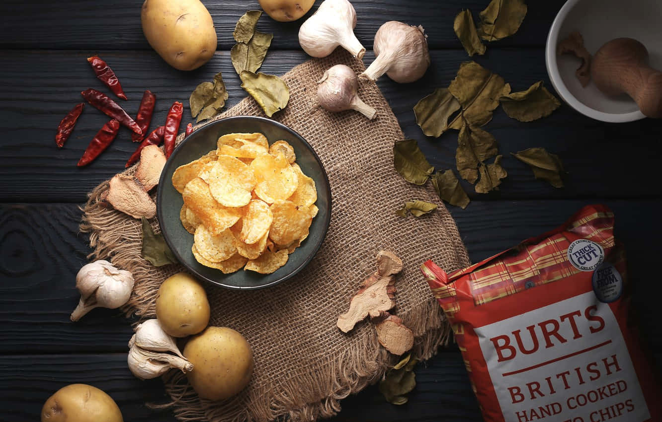 Hand Cooked Potato Chips In A Bowl Background