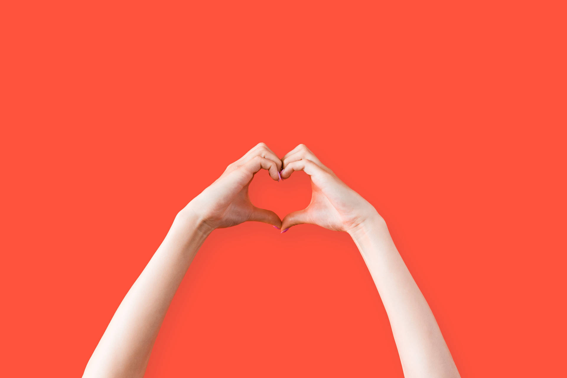 Hand Heart Orange Background