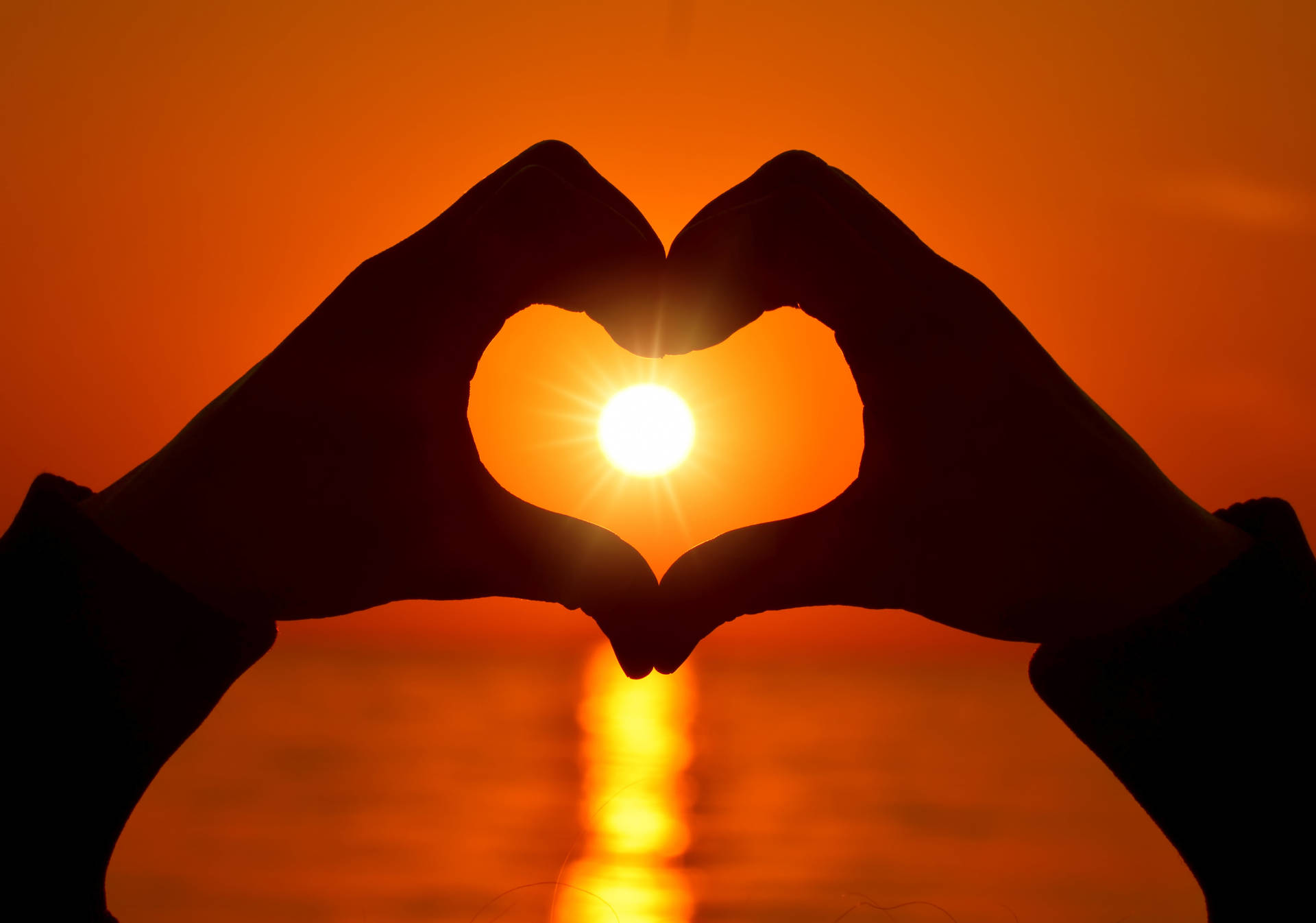 Hand Heart Sunset Background
