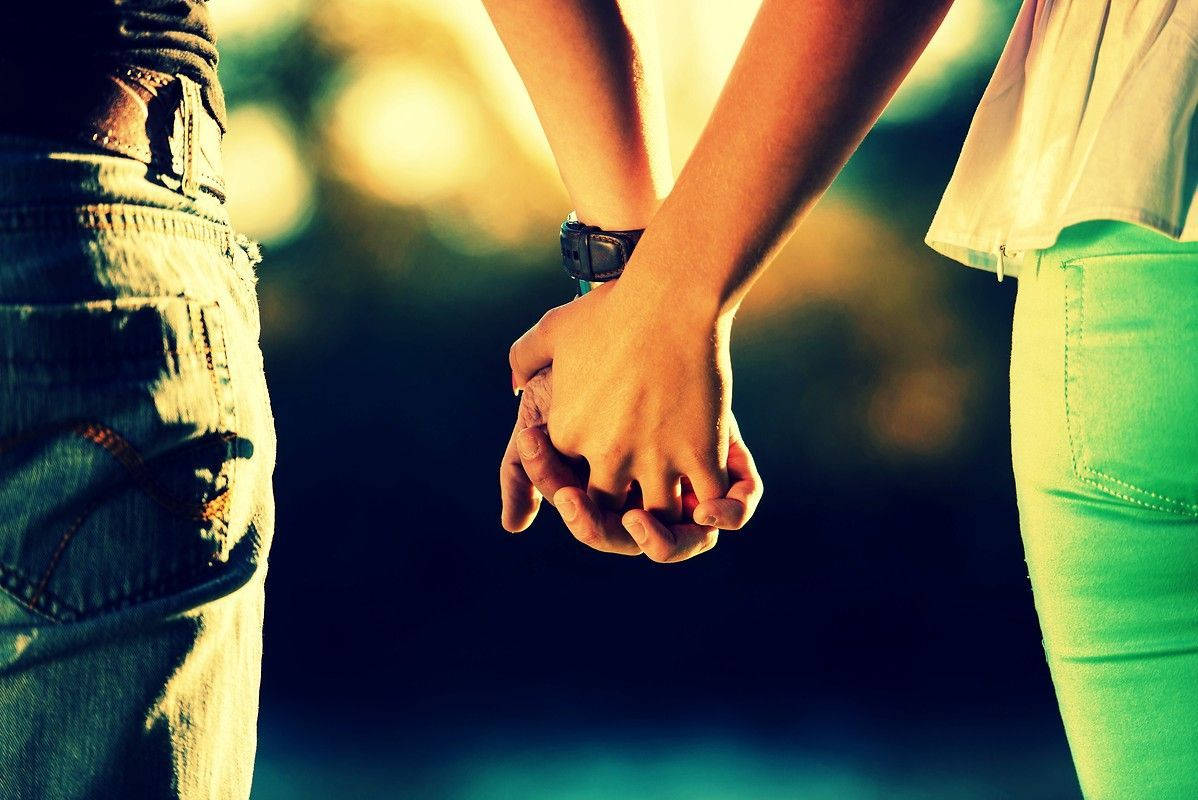 Hand In Hand Golden Sunlight Background