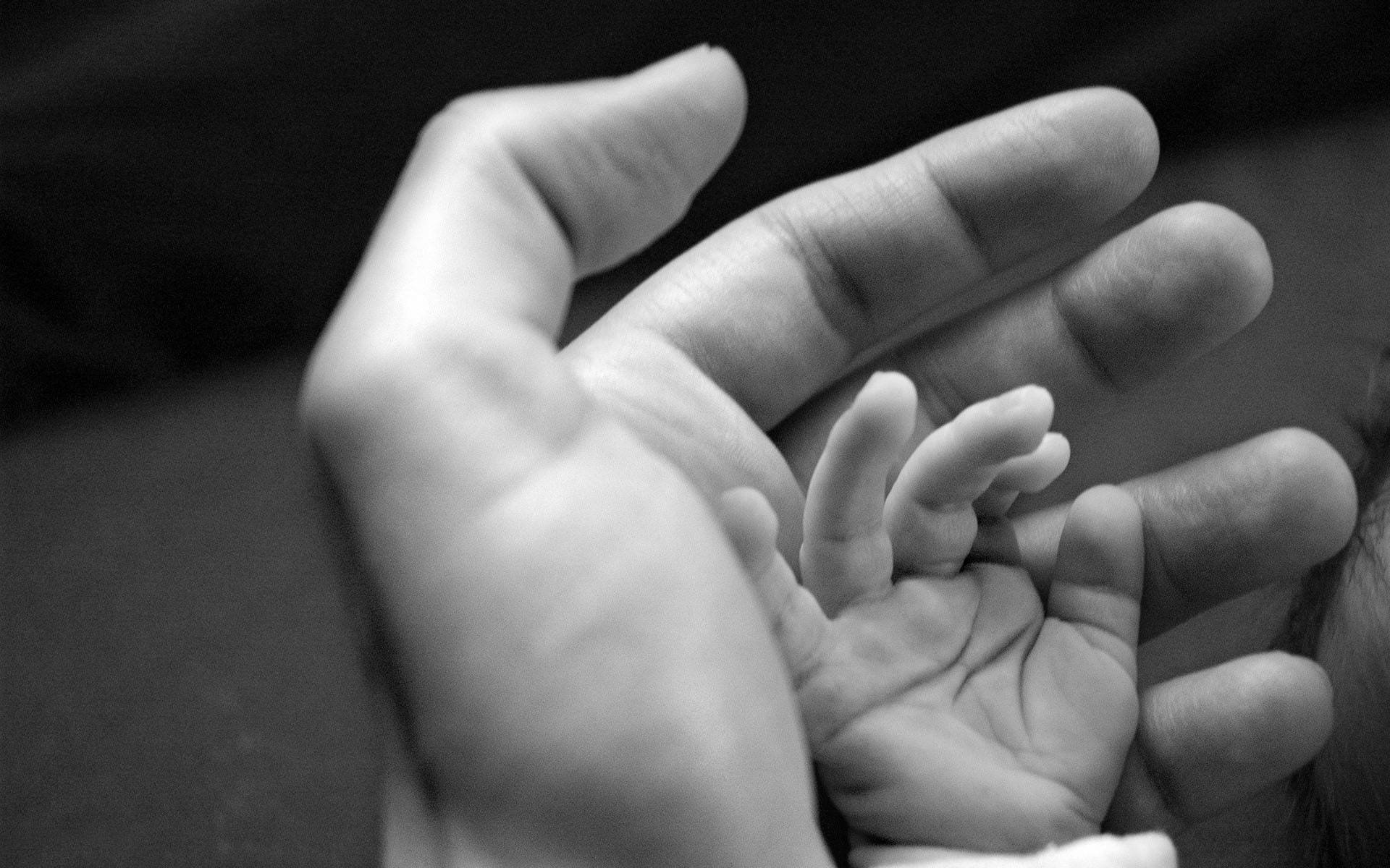 Hand In Hand Newborn Baby Background