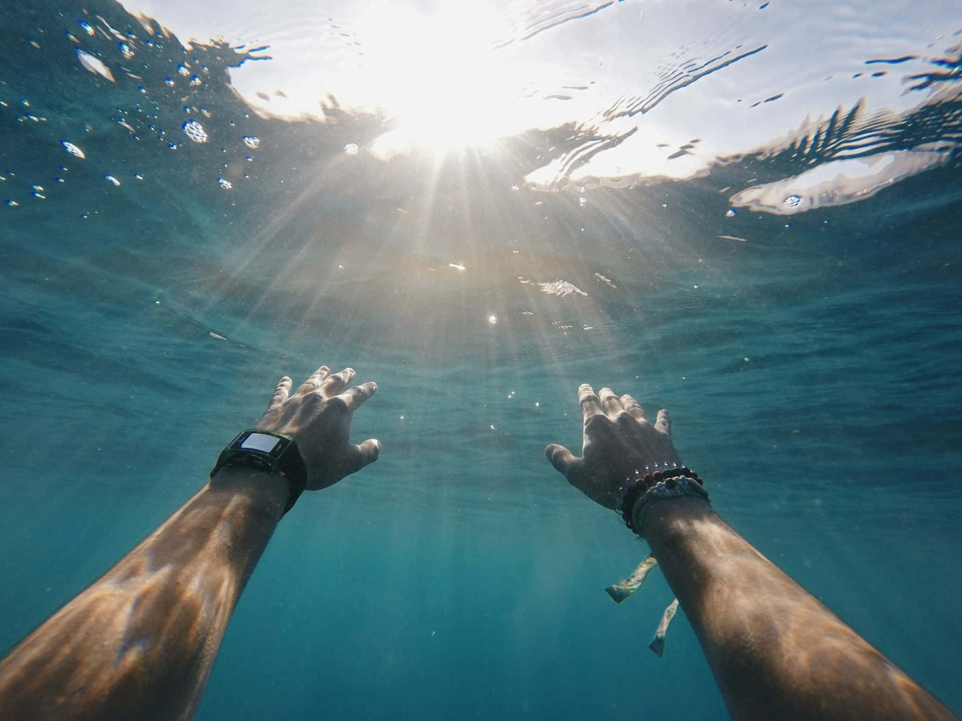 Hand Of A Resilient Person Underwater Background