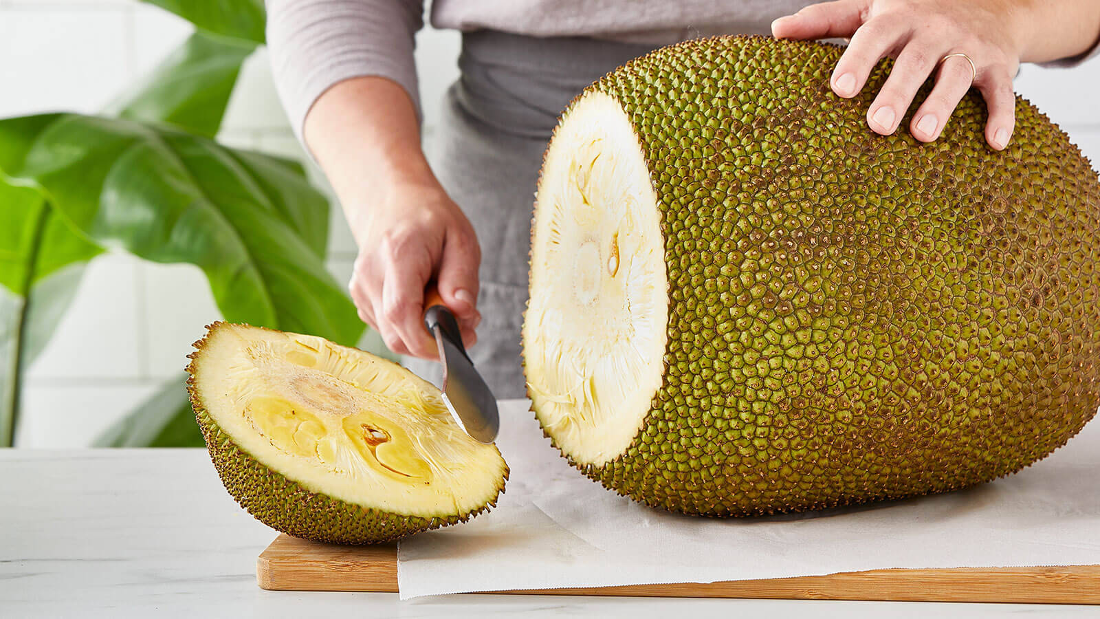 Hand Slicing Ripe Jackfruit Background