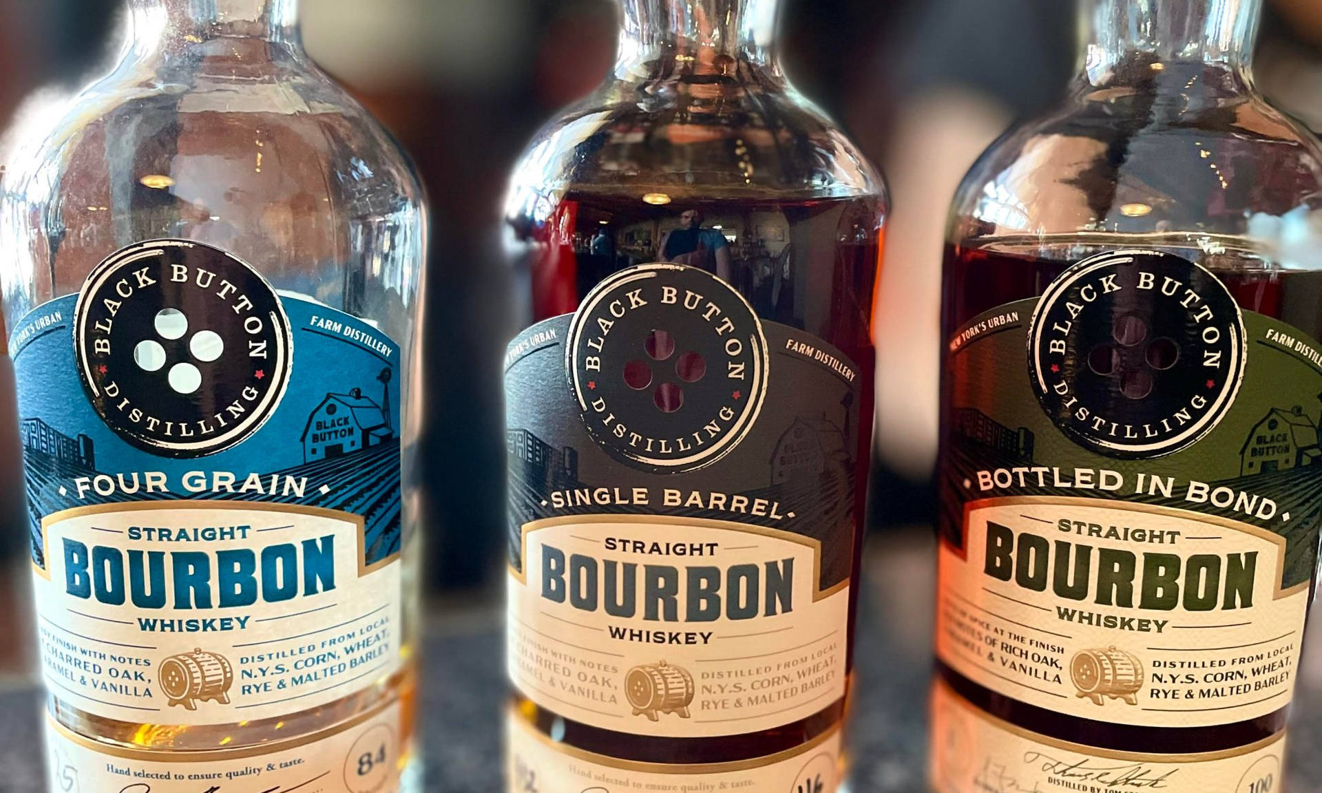 Handcrafted Spirits At Black Button Distilling Background