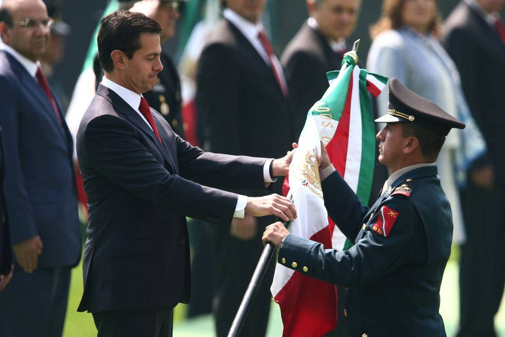 Handing Over The Mexico Flag Background
