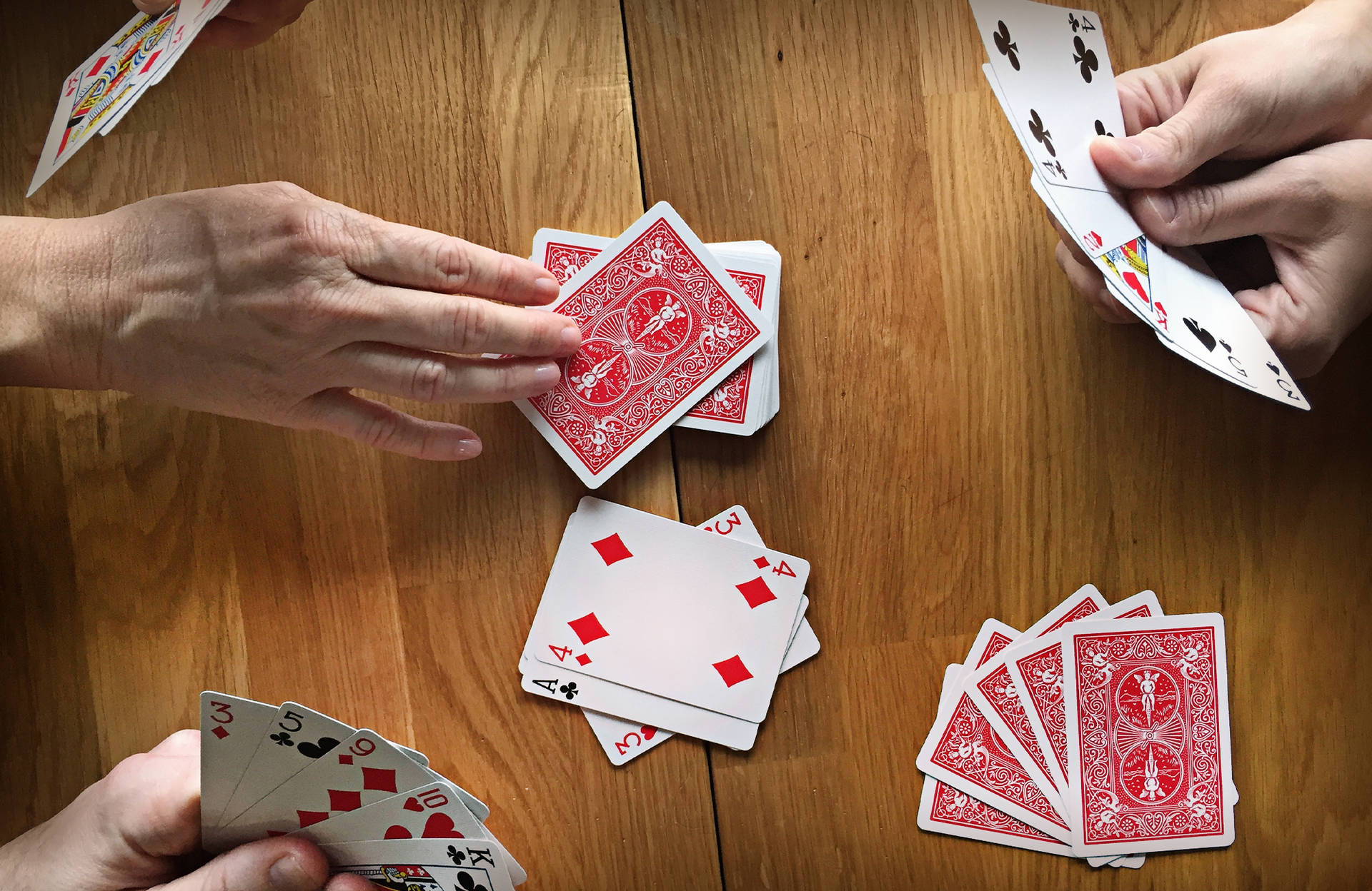 Hands Playing Rummy Game Background