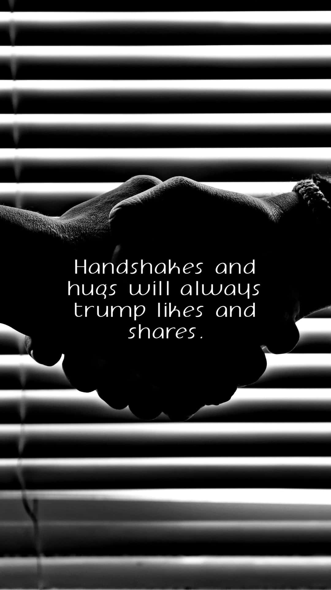 Handshake In Black And White With A Quote Background