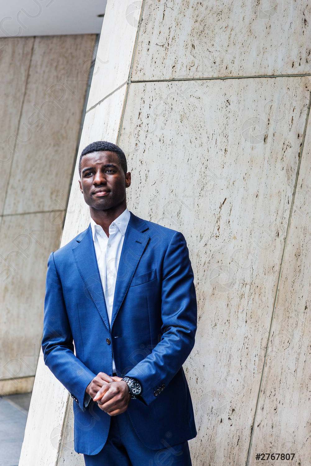 Handsome Black Man In A Blue Suit Background