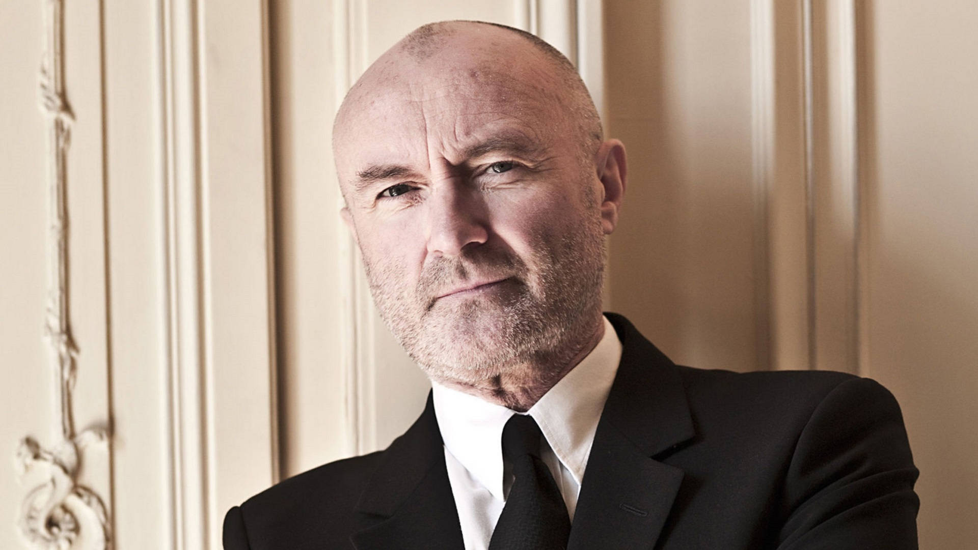 Handsome English Drummer Phil Collins Background