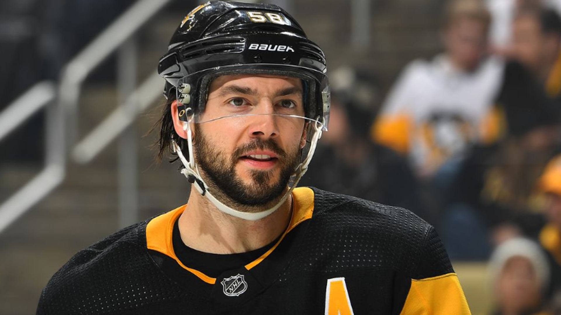 Handsome Ice Hockey Player Kris Letang Background