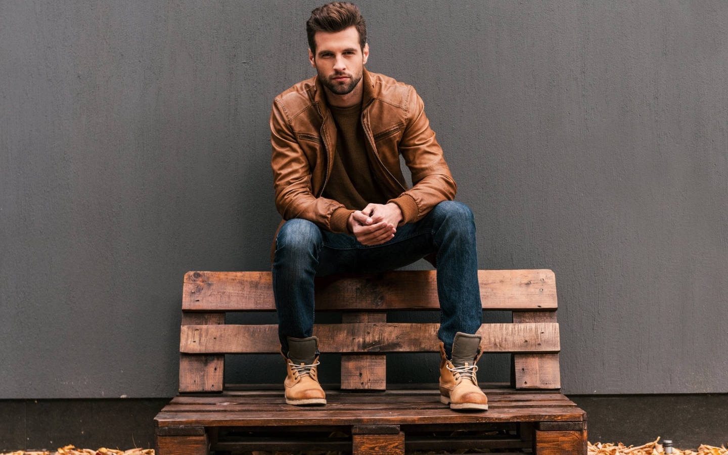 Handsome Man Sitting On Bench Background