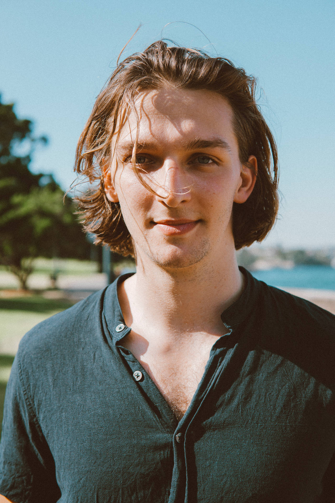 Handsome Man With Long Hair Background