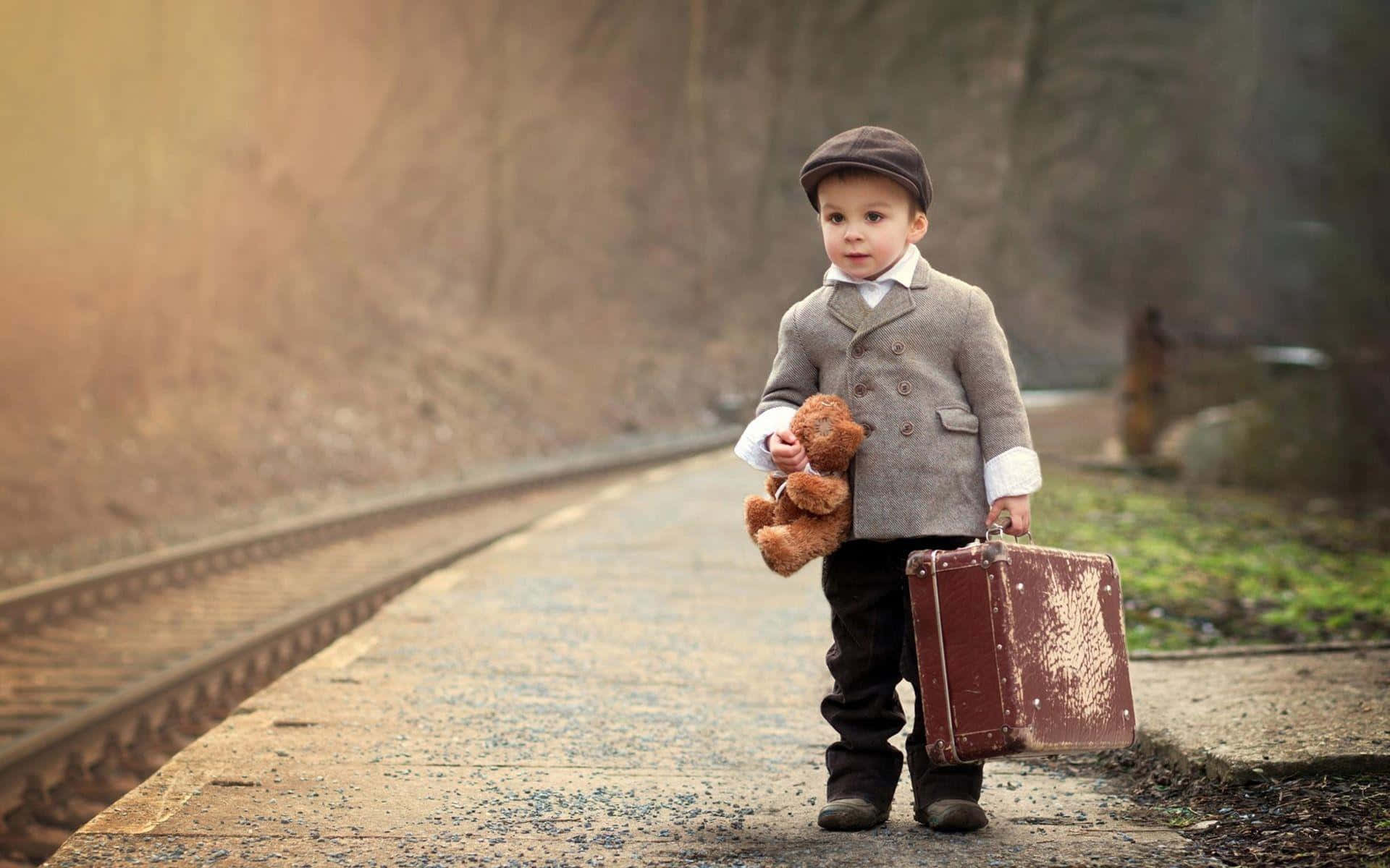 Handsome Stylish Boy On Railroad Background