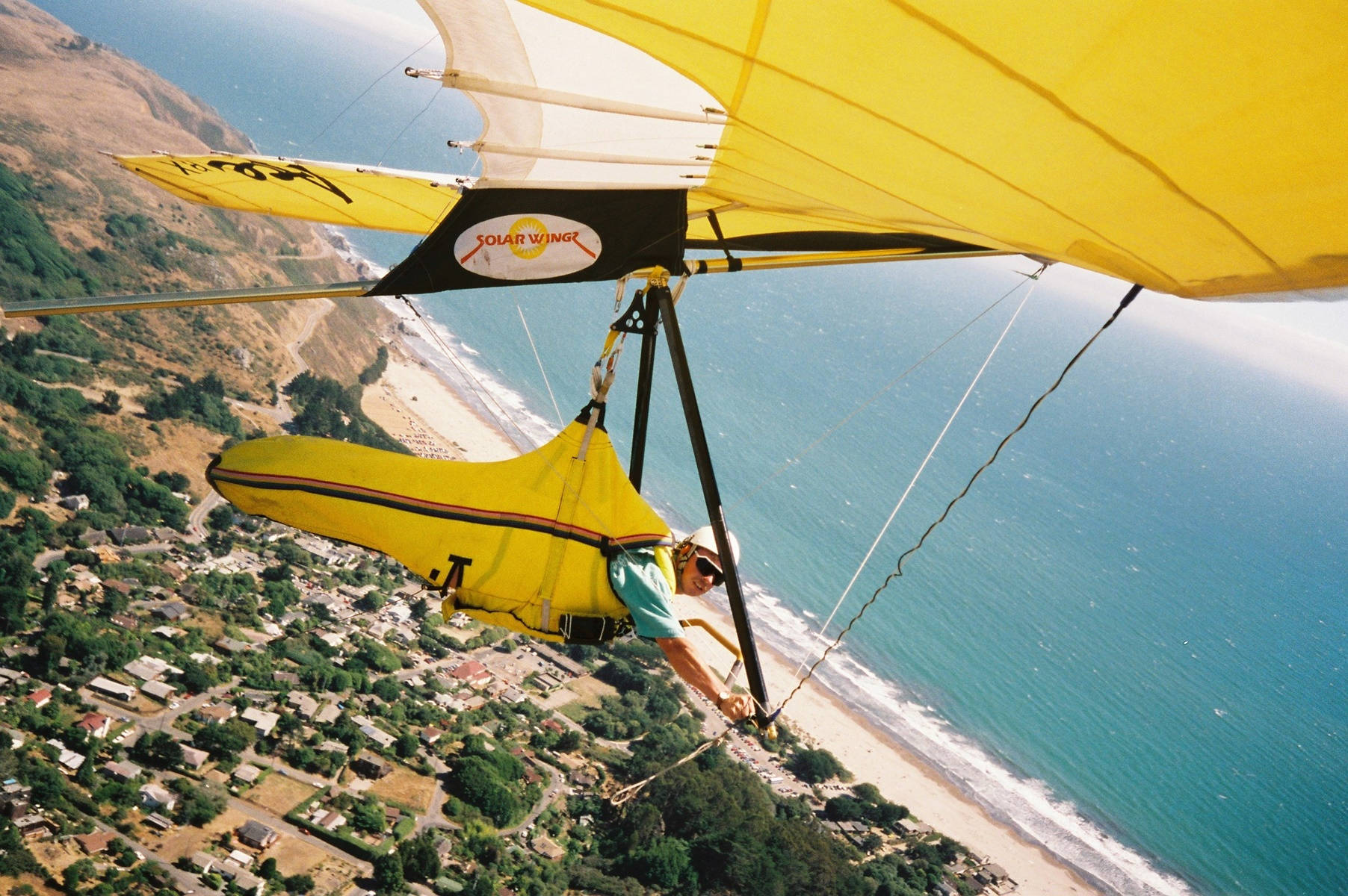 Hang Gliding Yellow Sailcloth White Beach Background