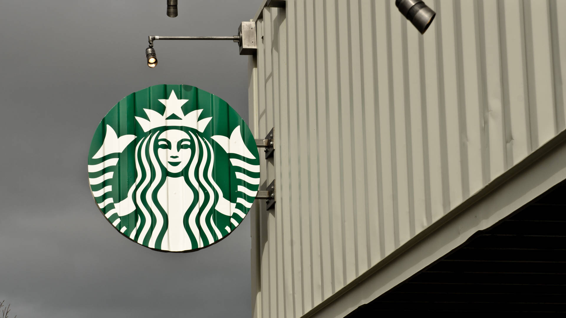 Hanging Starbucks Logo Display Background