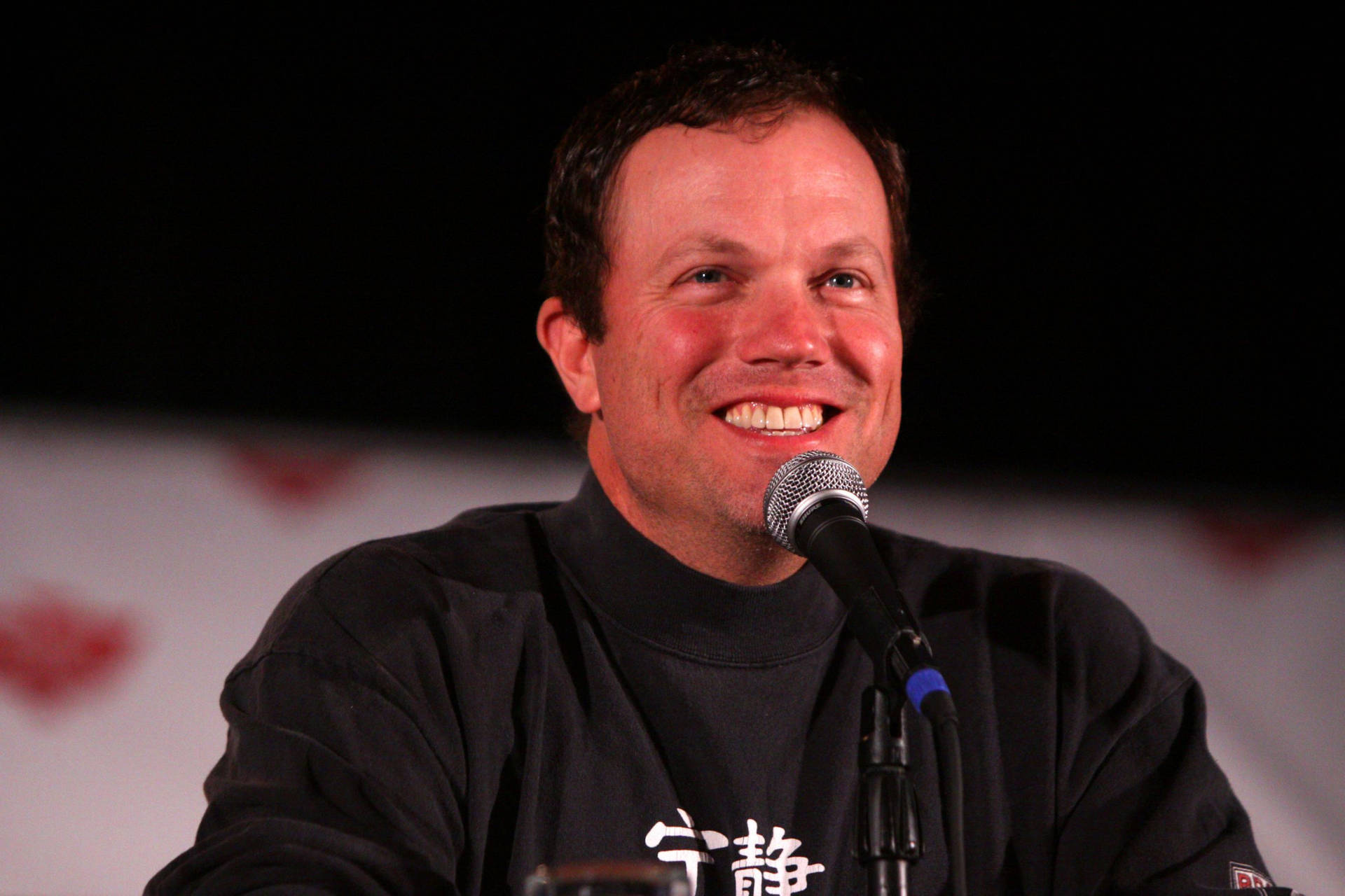 Happy Adam Baldwin Background