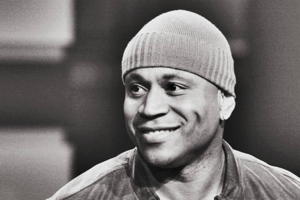 Happy American Rapper Ll Cool J Beanie Background