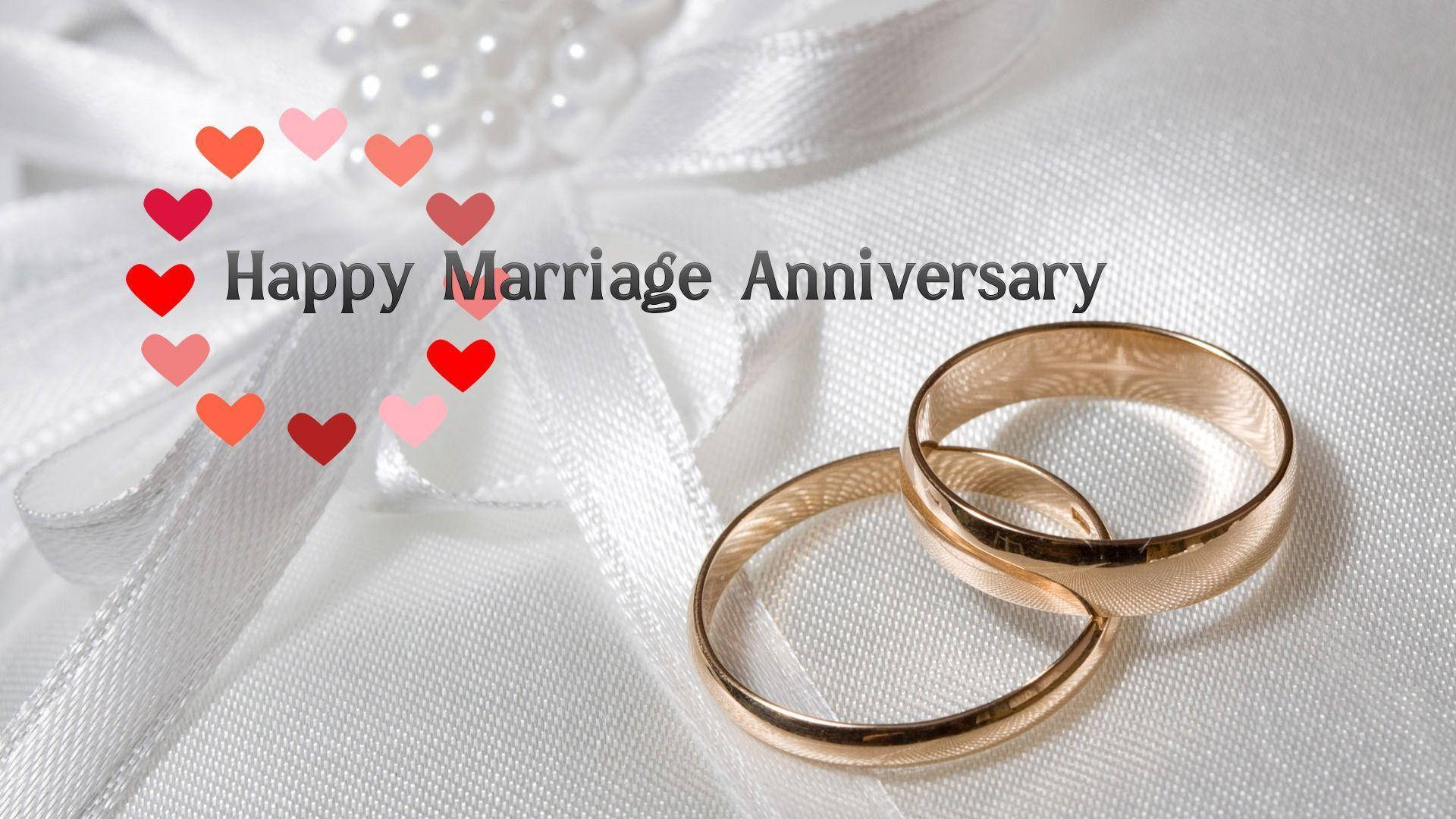 Happy Anniversary Gold Wedding Rings Background