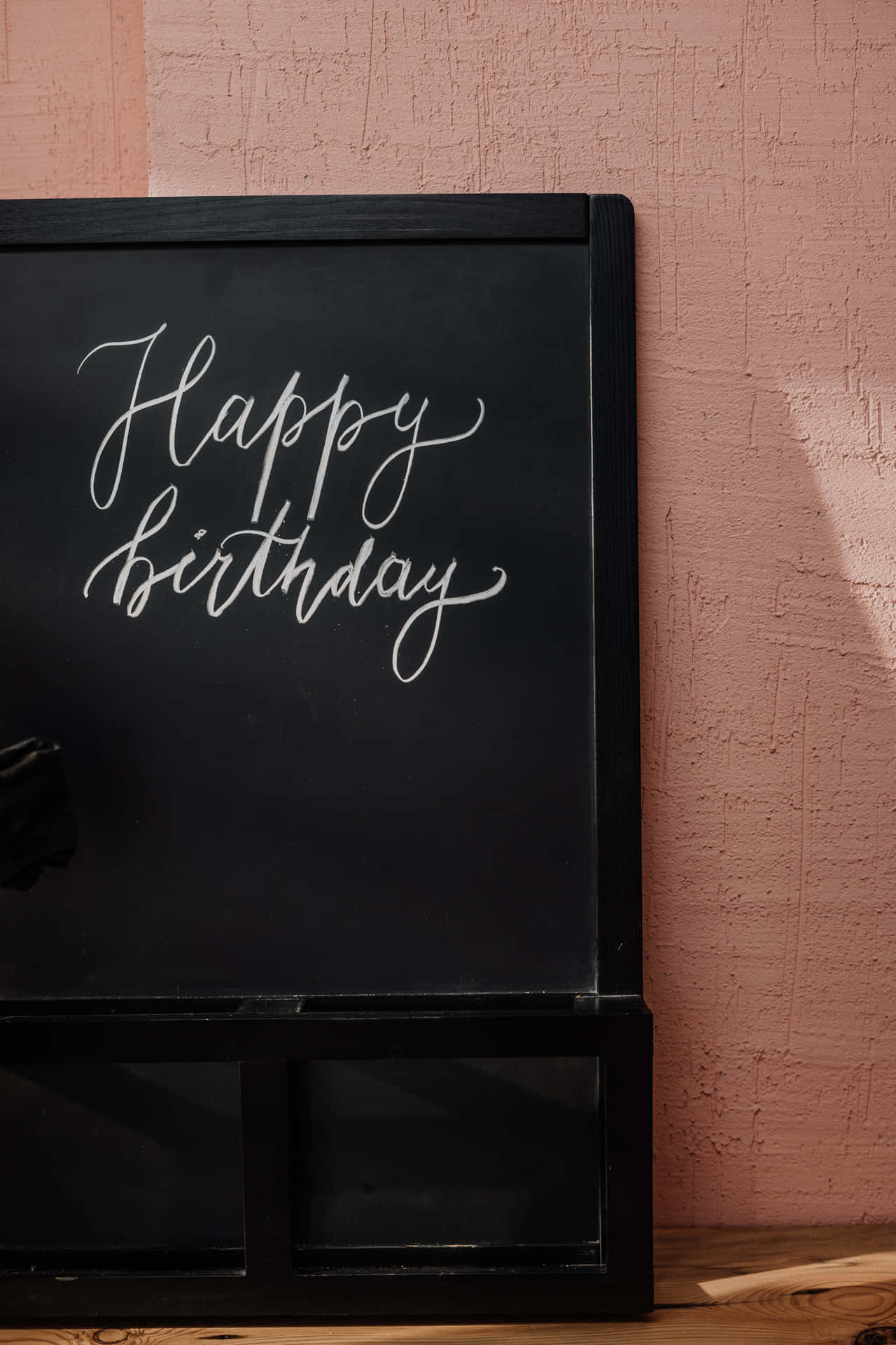 Happy Birthday Chalkboard On A Pink Wall Background