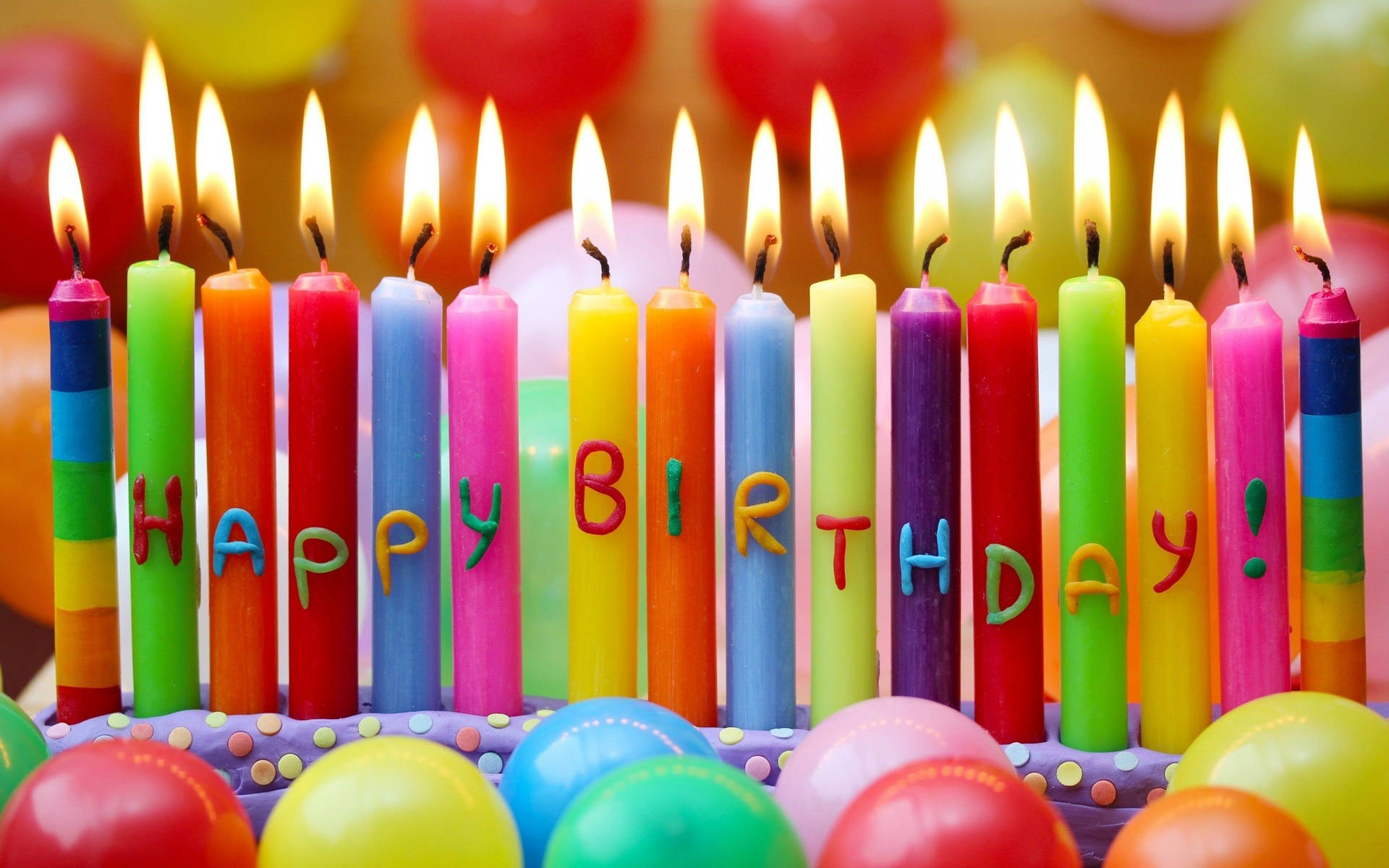 Happy Birthday Colored Candles Background