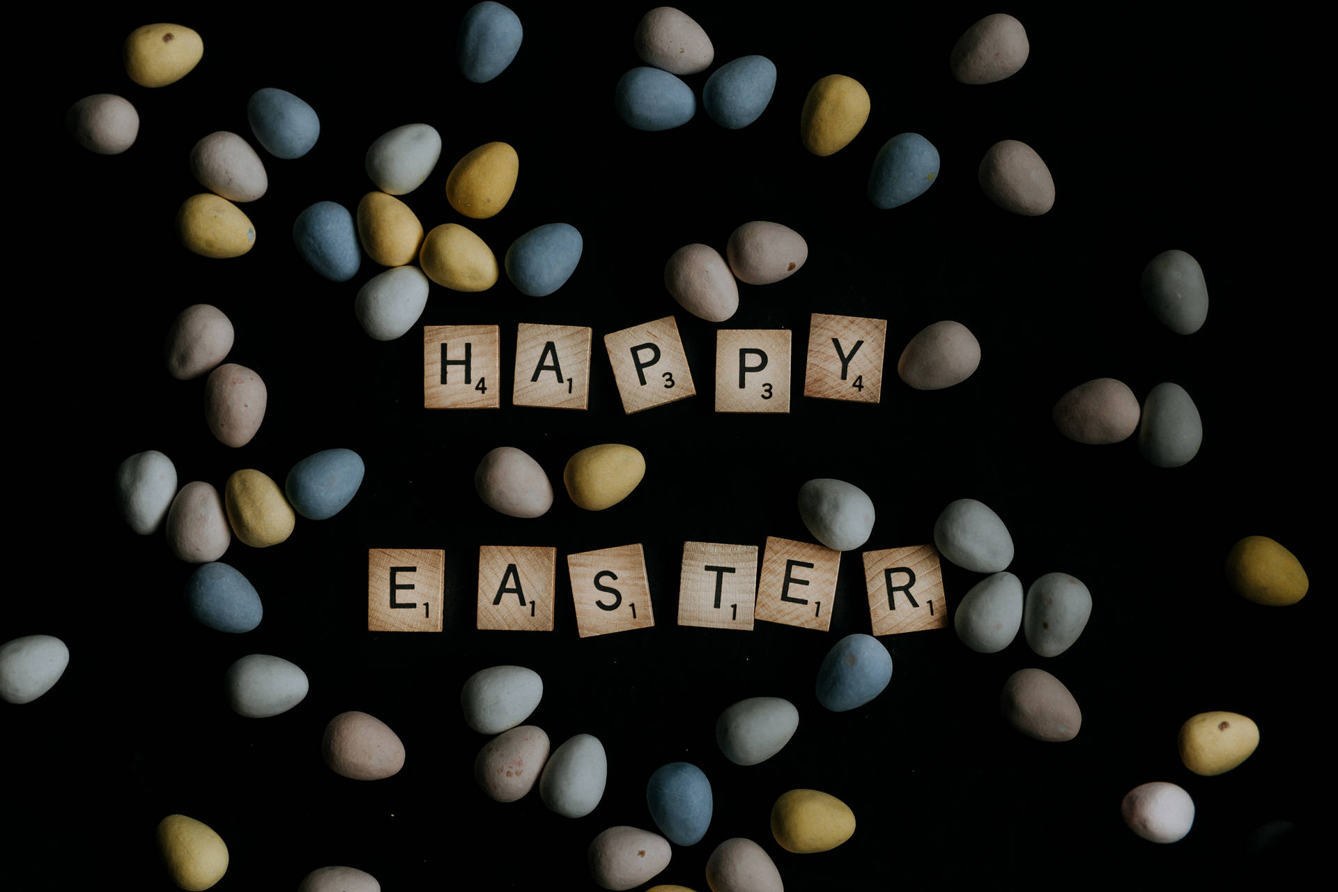 Happy Easter Scrabble Tiles Yellow And Blue Eggs Background