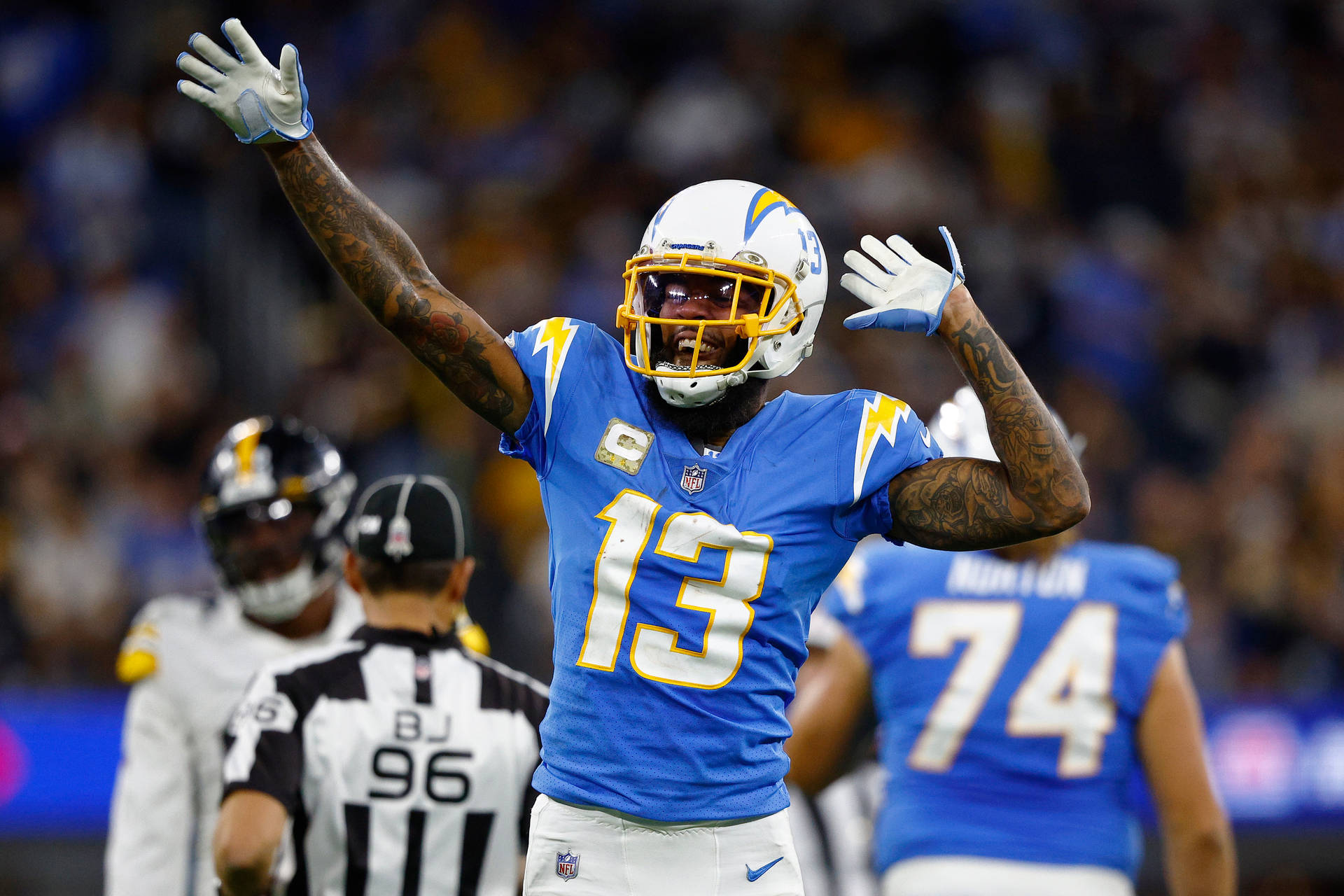 Happy Keenan Allen Hands Raised Background