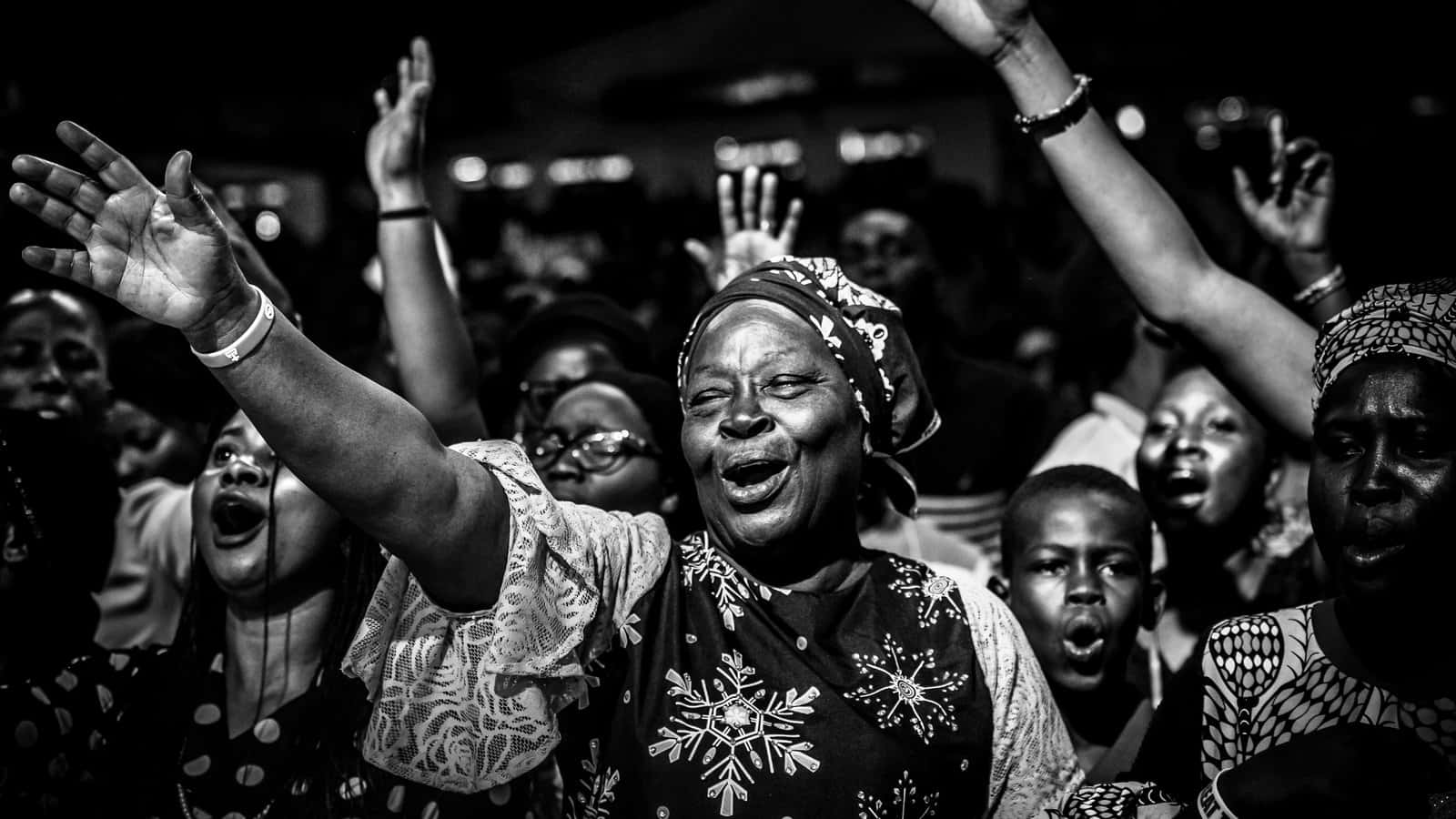 Happy Nigerian Woman With Other People