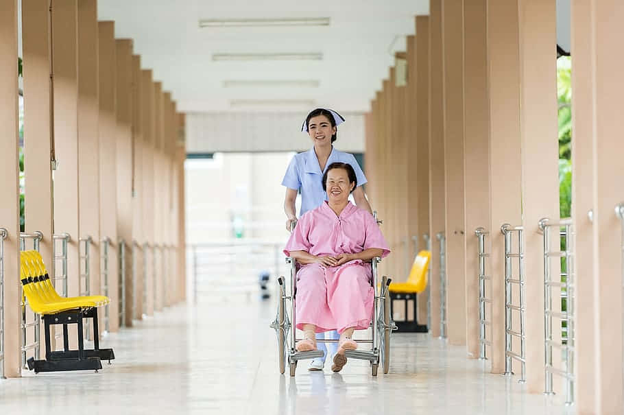 Happy Nursing Assisting Old Woman Background