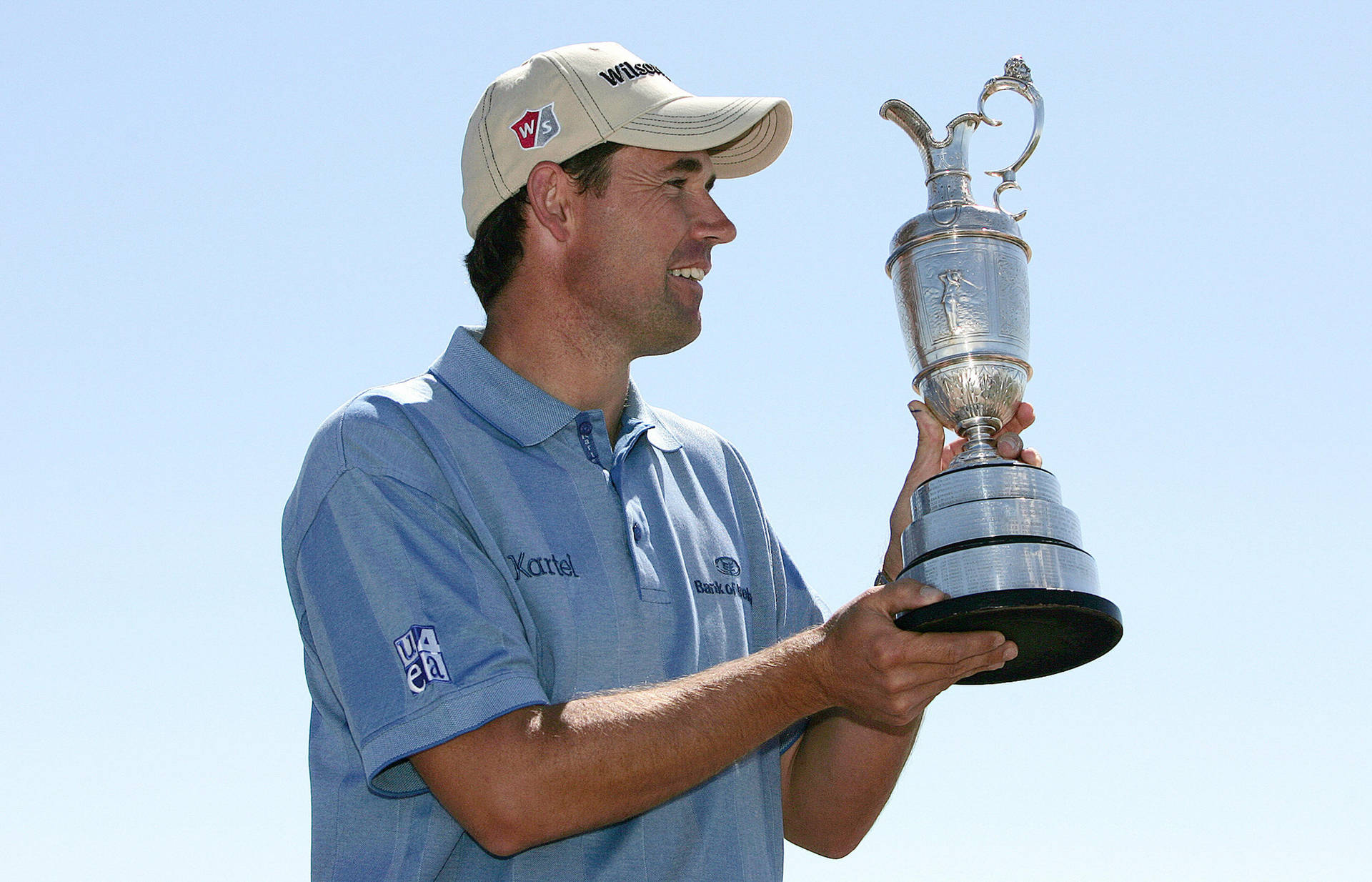 Happy Padraig Harrington With Trophy Background