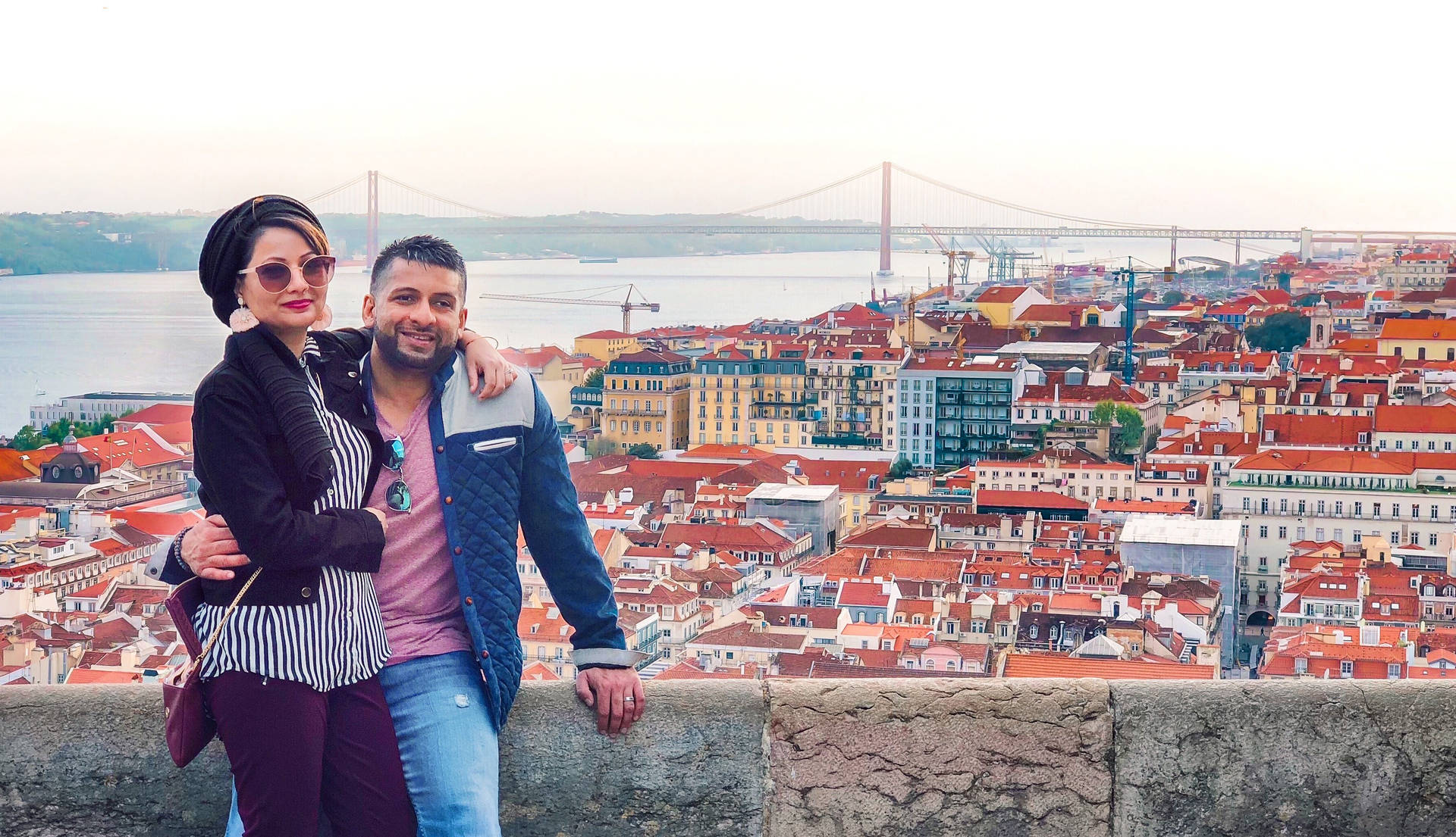 Happy Tourists In Lisbon Background