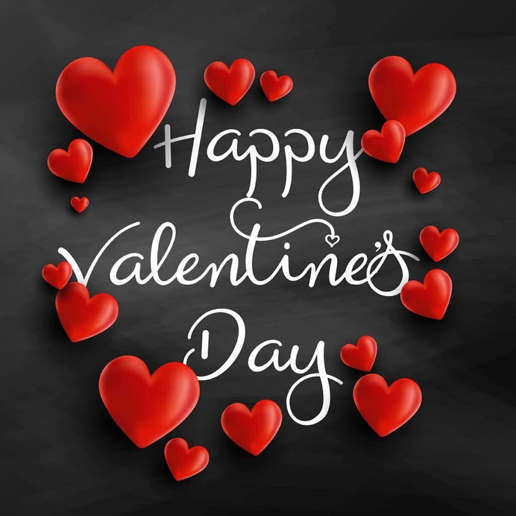 Happy Valentine's Day With Red Hearts On A Blackboard Background