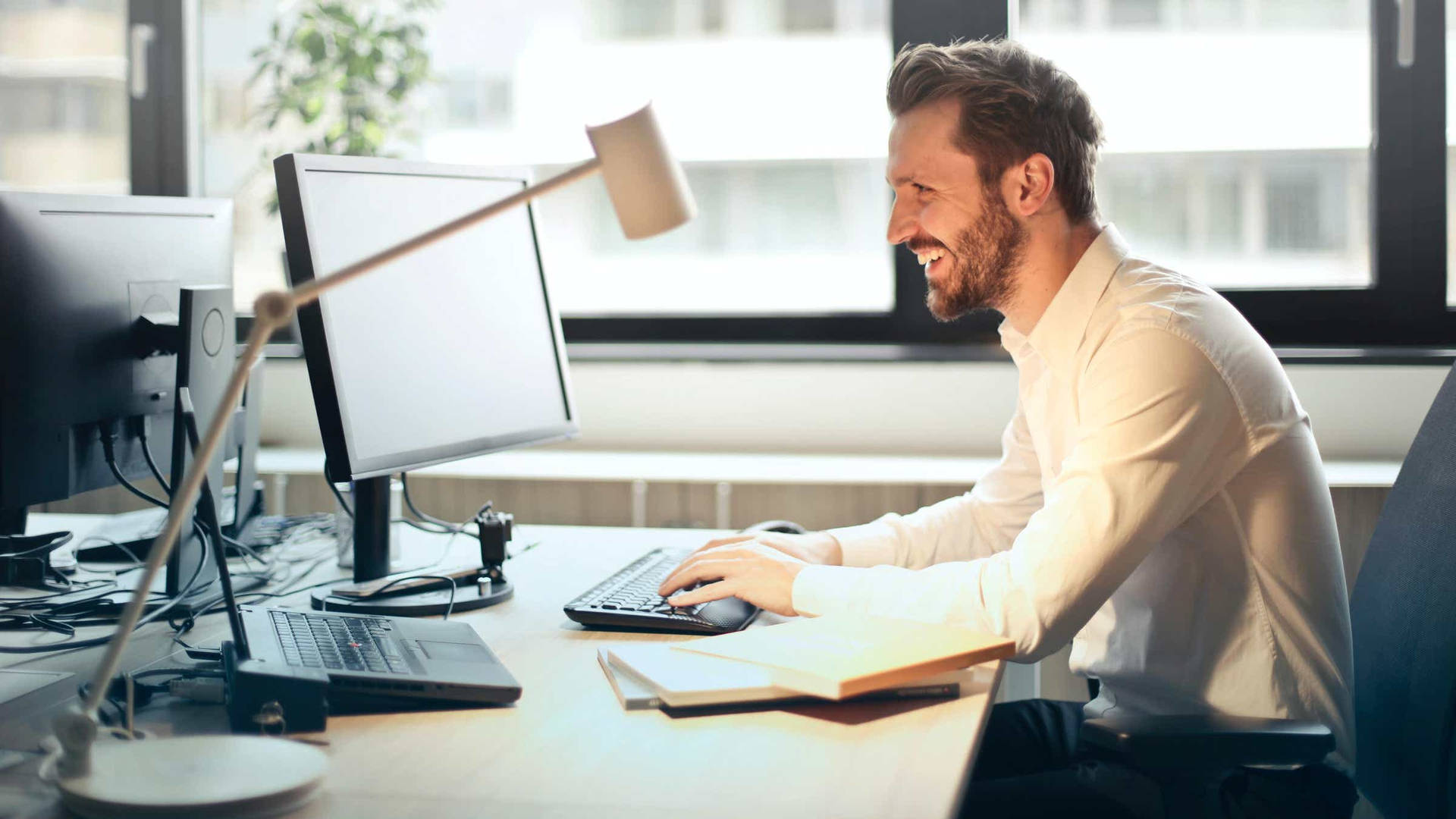 Hard-working Happy Secretary In A Busy Office Environment