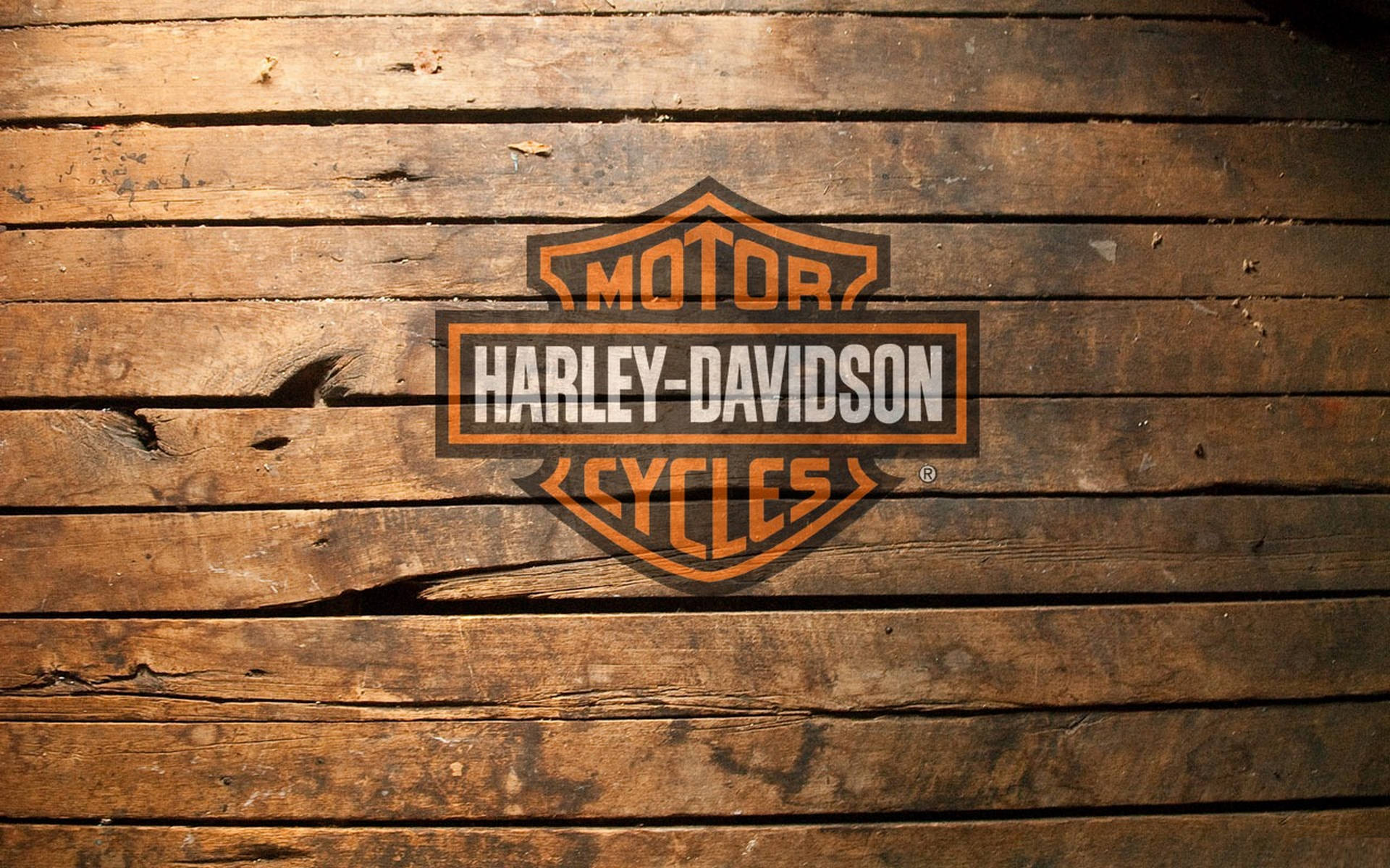 Harley Davidson Logo On Wood Background