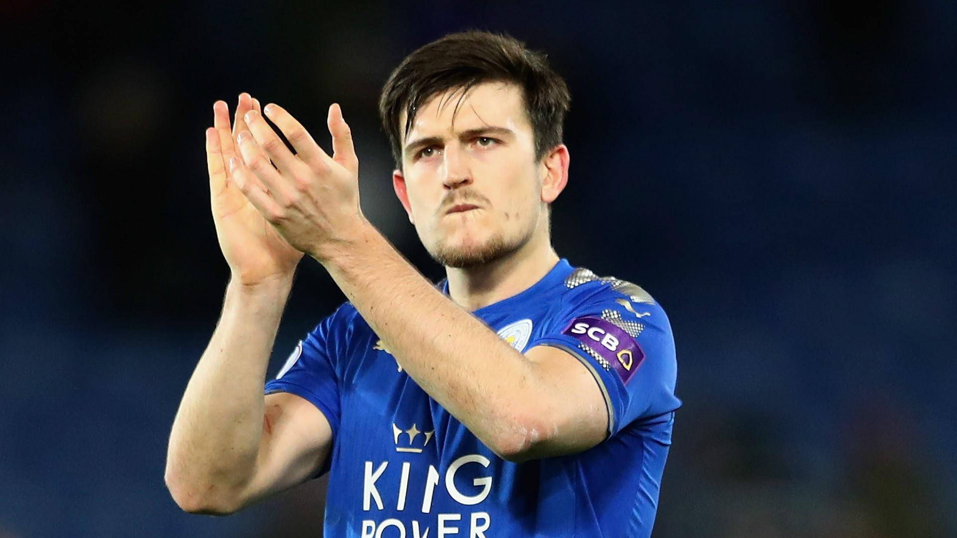 Harry Maguire Clapping In A Blue Uniform Background