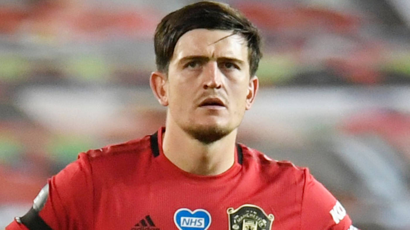 Harry Maguire Dominating The Field Background