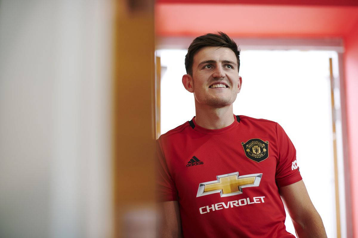 Harry Maguire In A Chevrolet Red Jersey Background