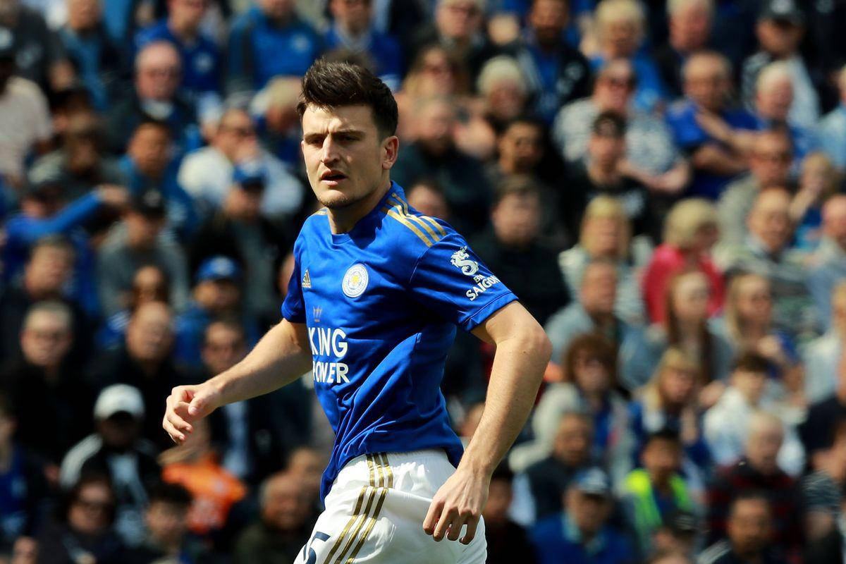 Harry Maguire Running In A Blue Uniform