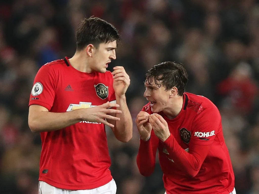 Harry Maguire With Victor Lindelof Background