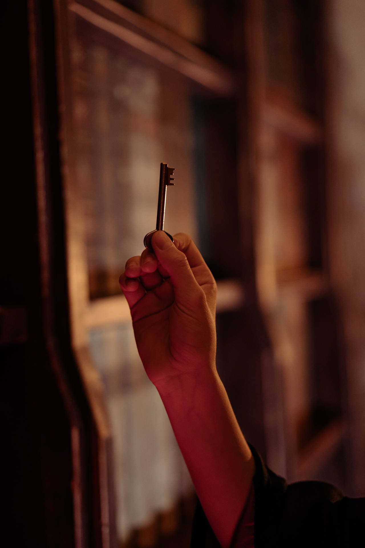 Harry Potter Aesthetic Hand Holding A Key Background
