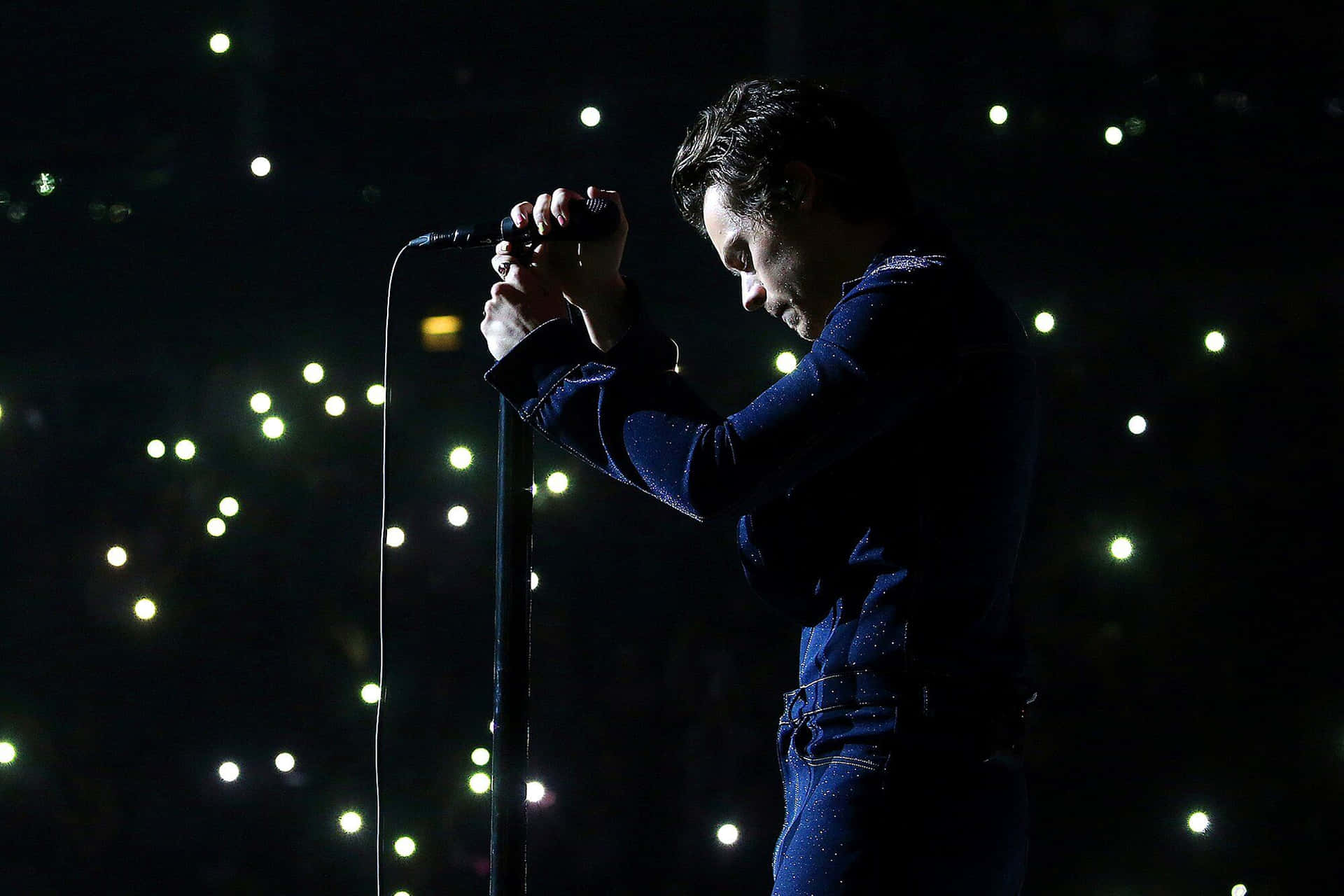 Harry Styles Playing On His Laptop