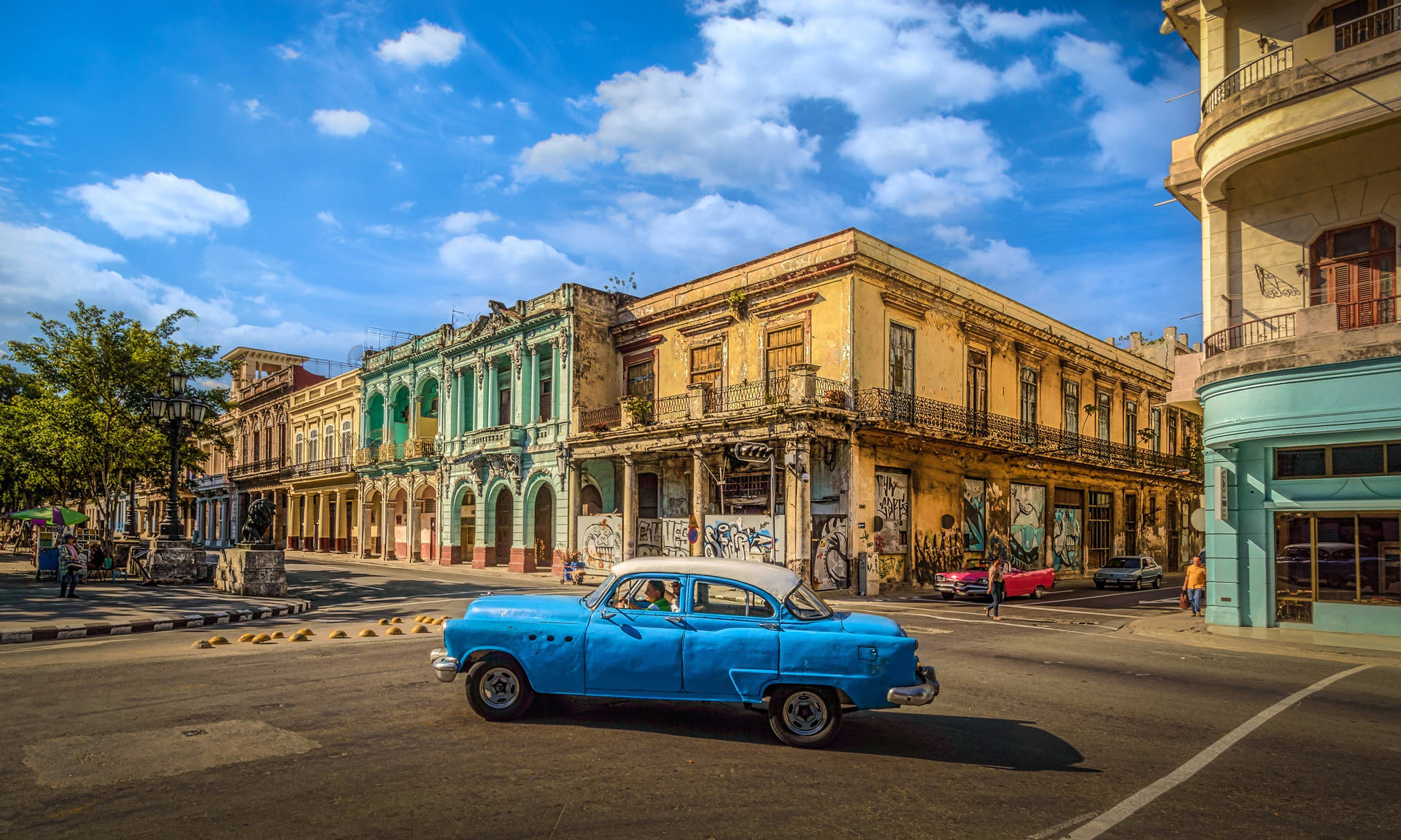 Havana Blue Car Turning Left Background