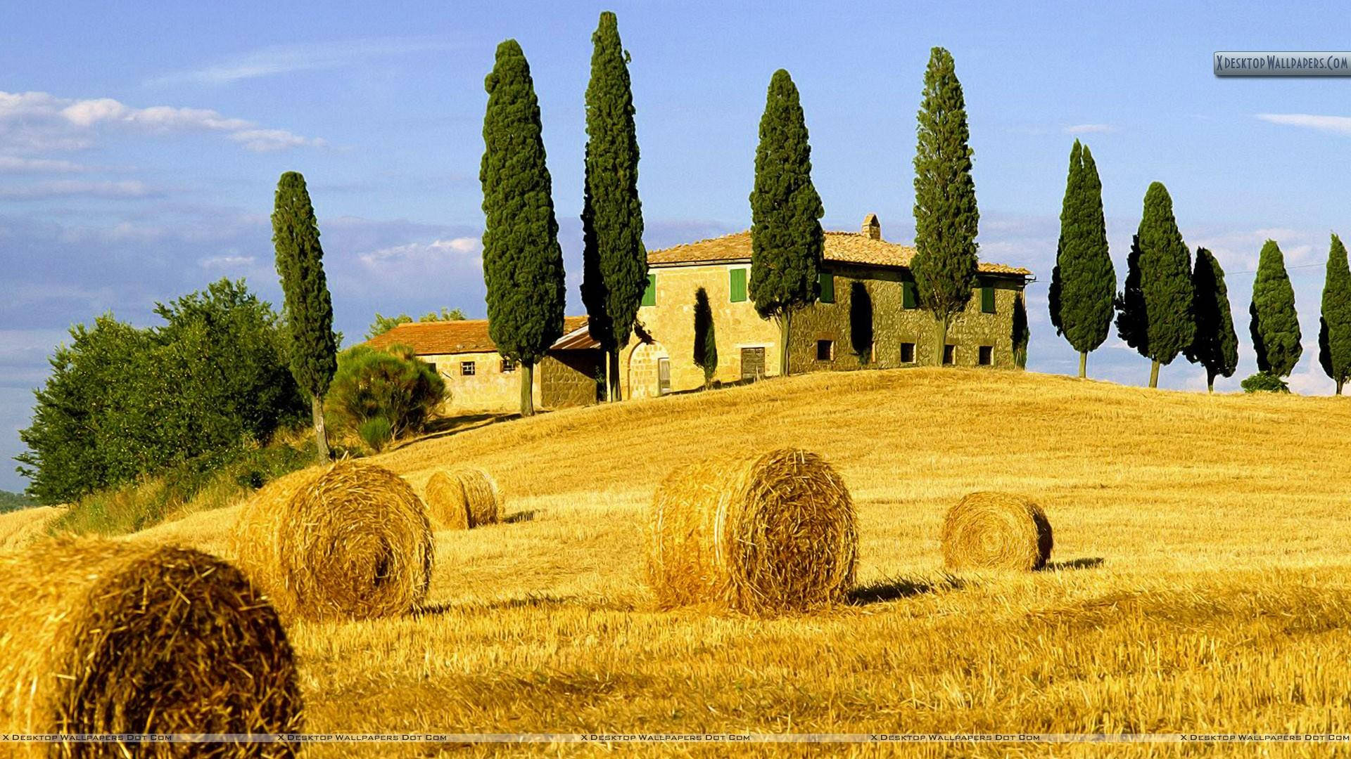 Hay Bales Outside Tuscany House Background