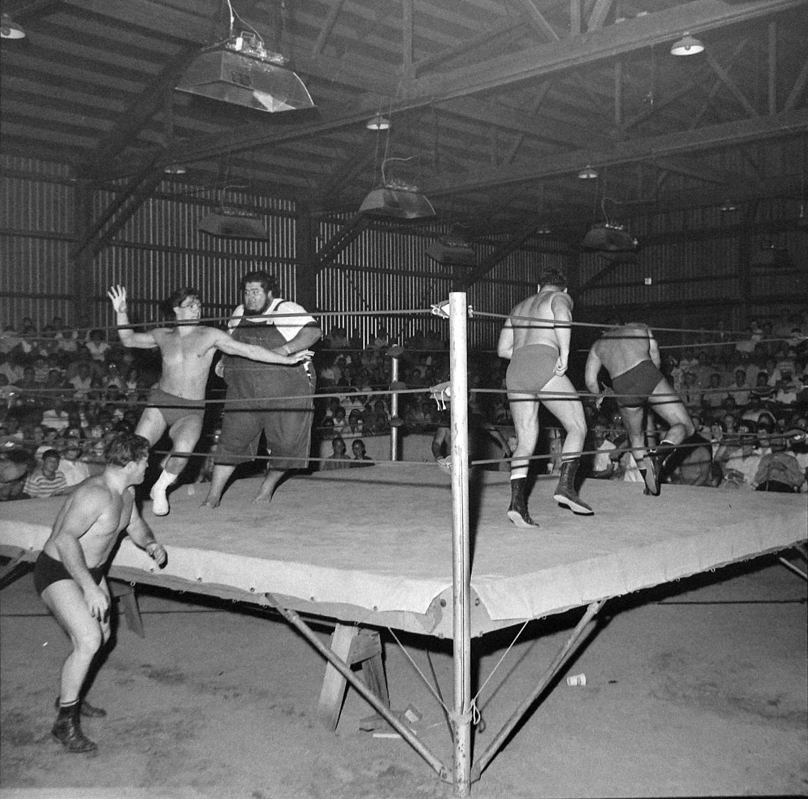 Haystacks Calhoun With Four Wrestlers In Fairgrounds Expo Background