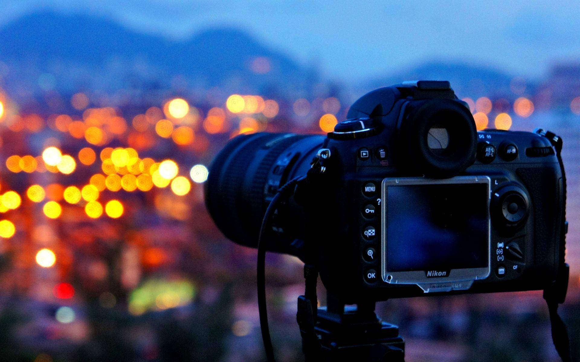 Hd Camera With Bokeh City Lights Background