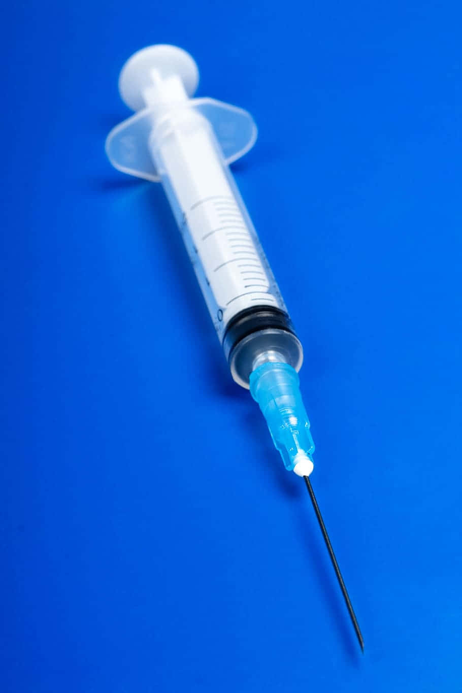 Hd Medical Syringe On Blue Background