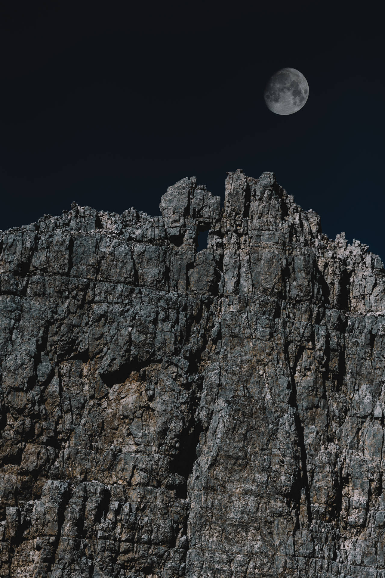 Hd Moon Over Cliffside Background