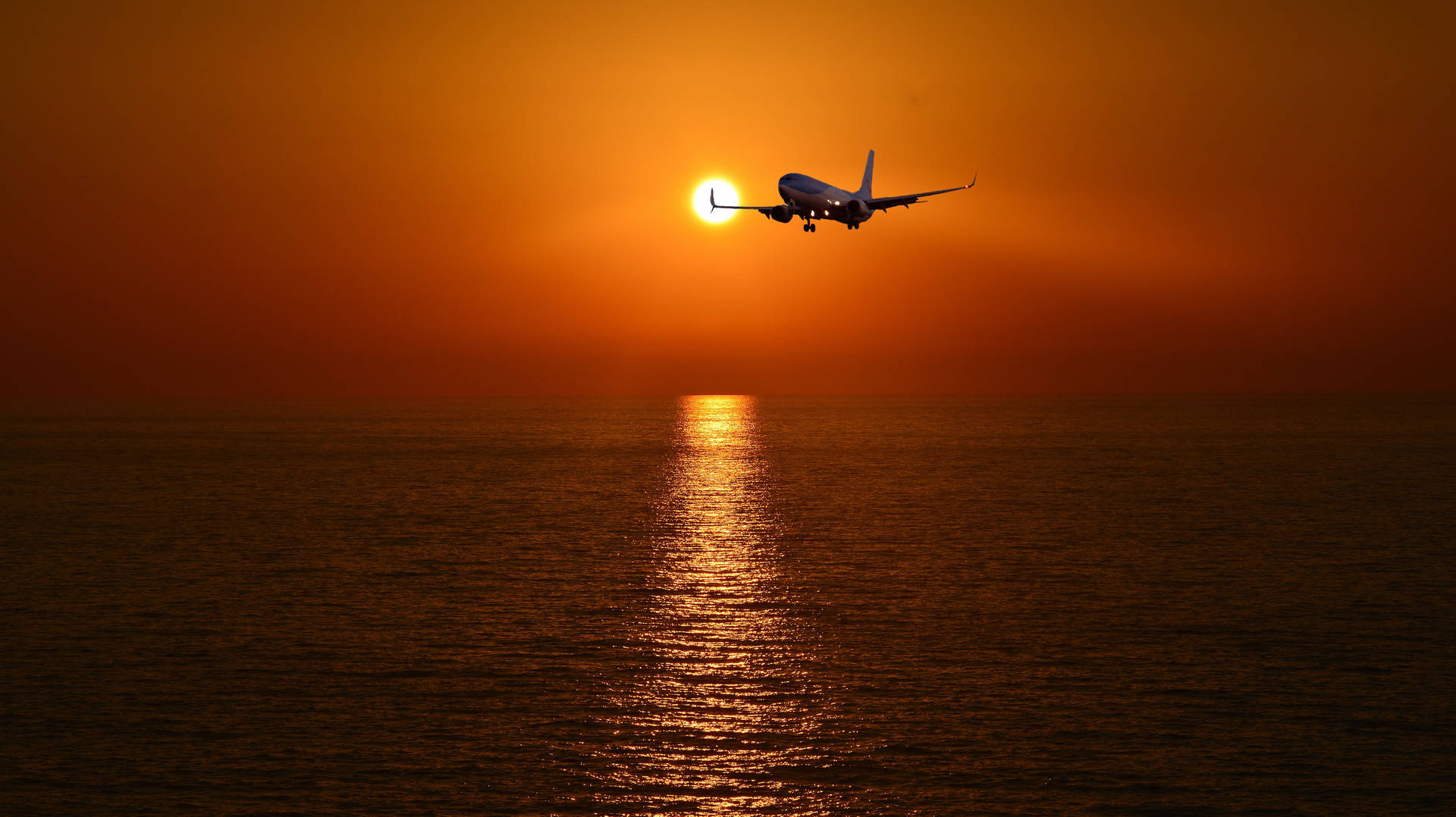 Hd Plane Flying Into Sunset Background