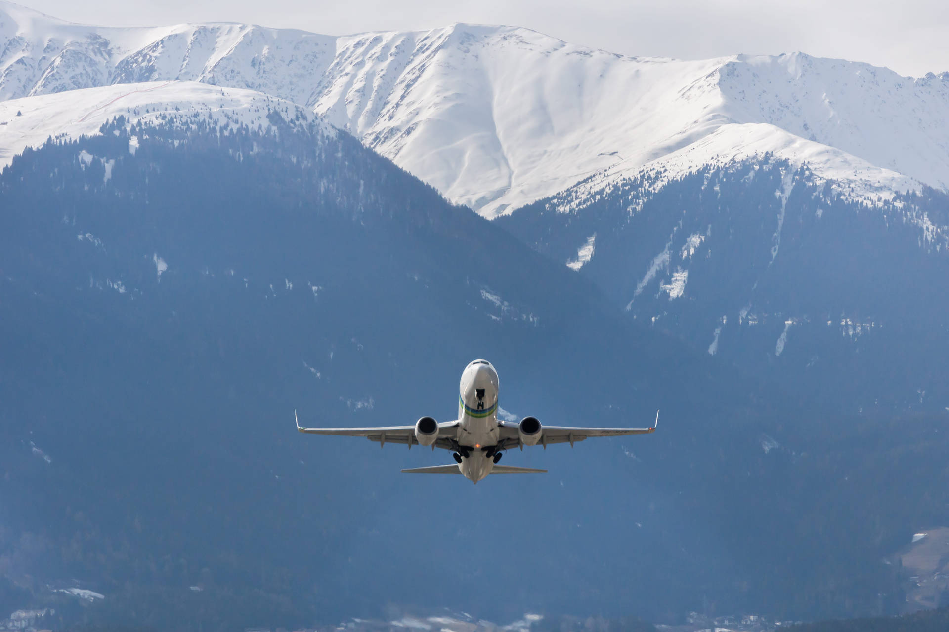 Hd Plane Flying Snowy Mountains Background