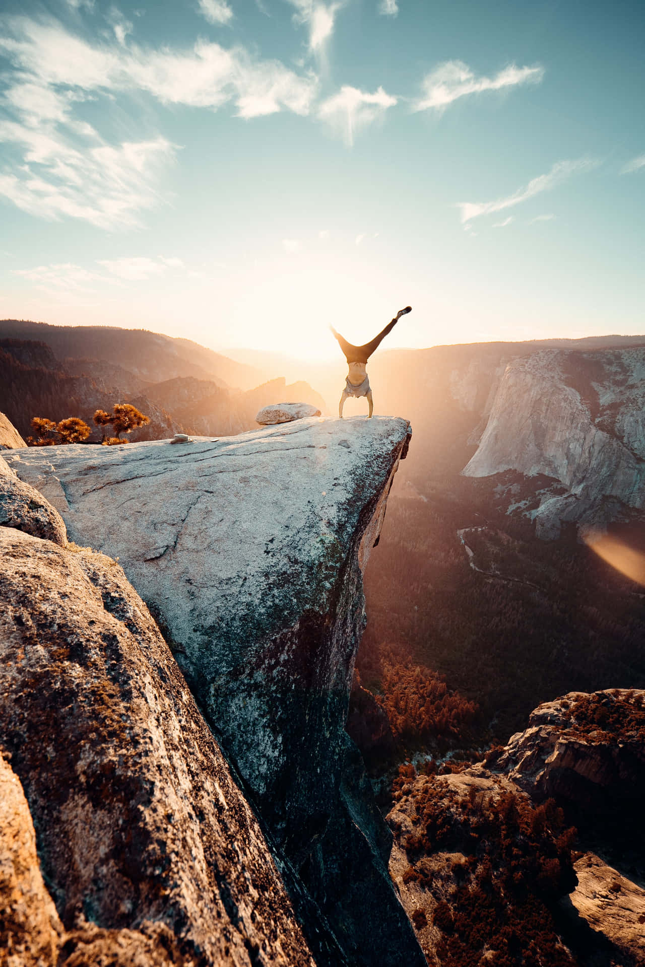 Head Stand On Cliff Nature Android Hd Background